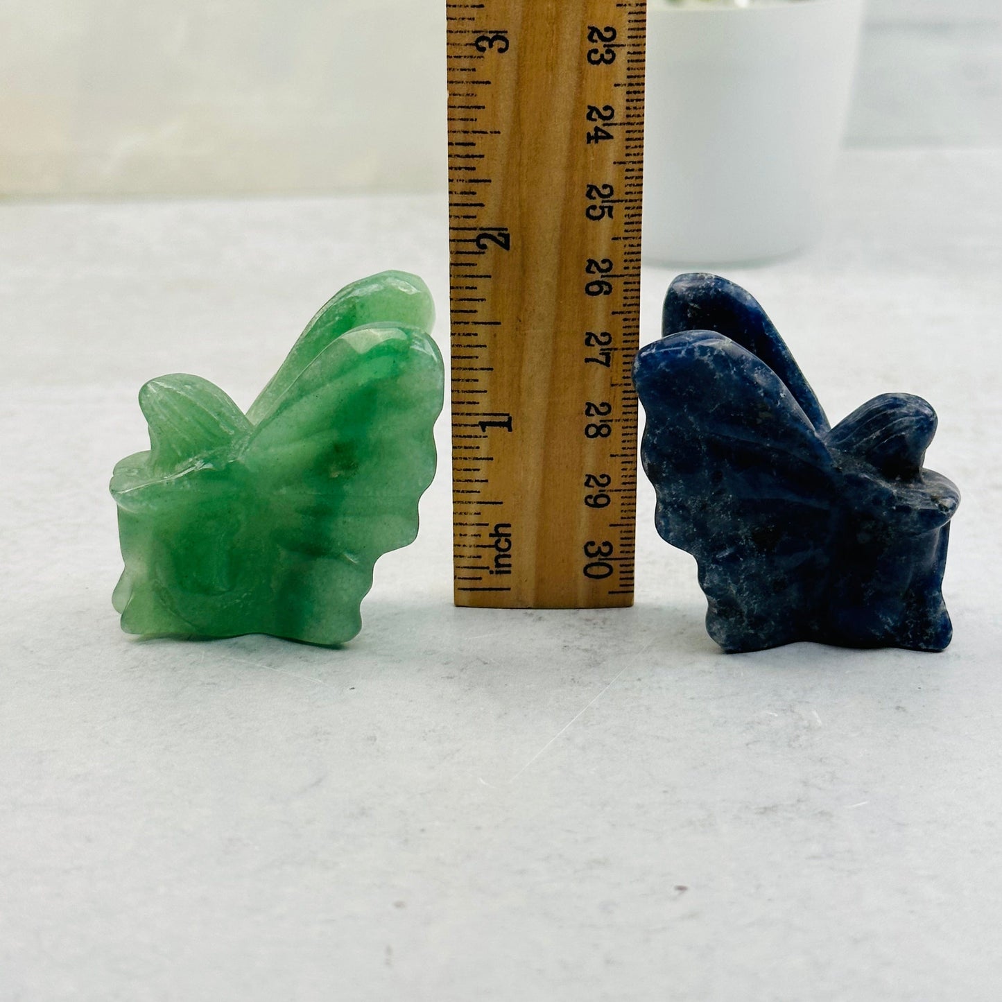 fairy next to a ruler for size reference 