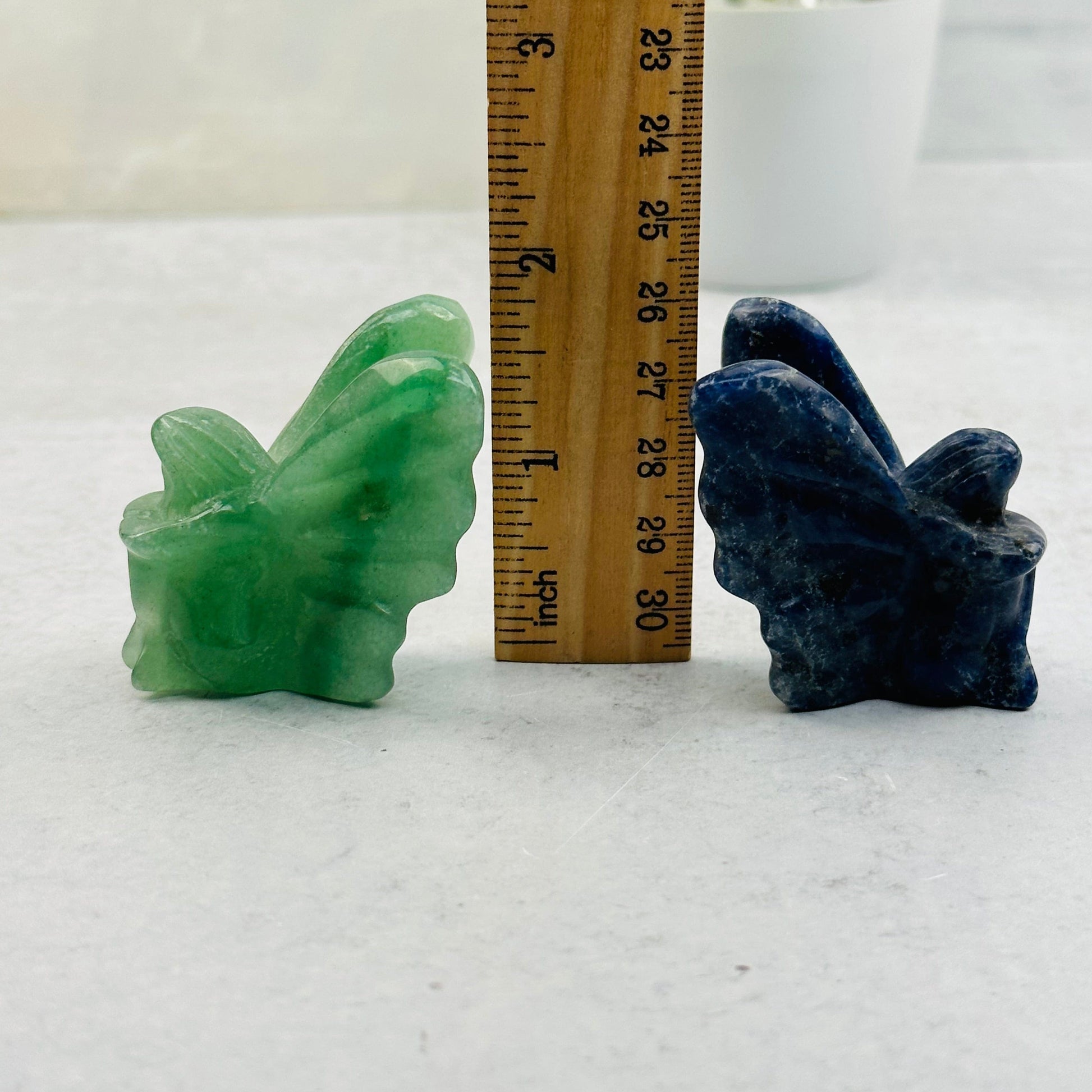 fairy next to a ruler for size reference 