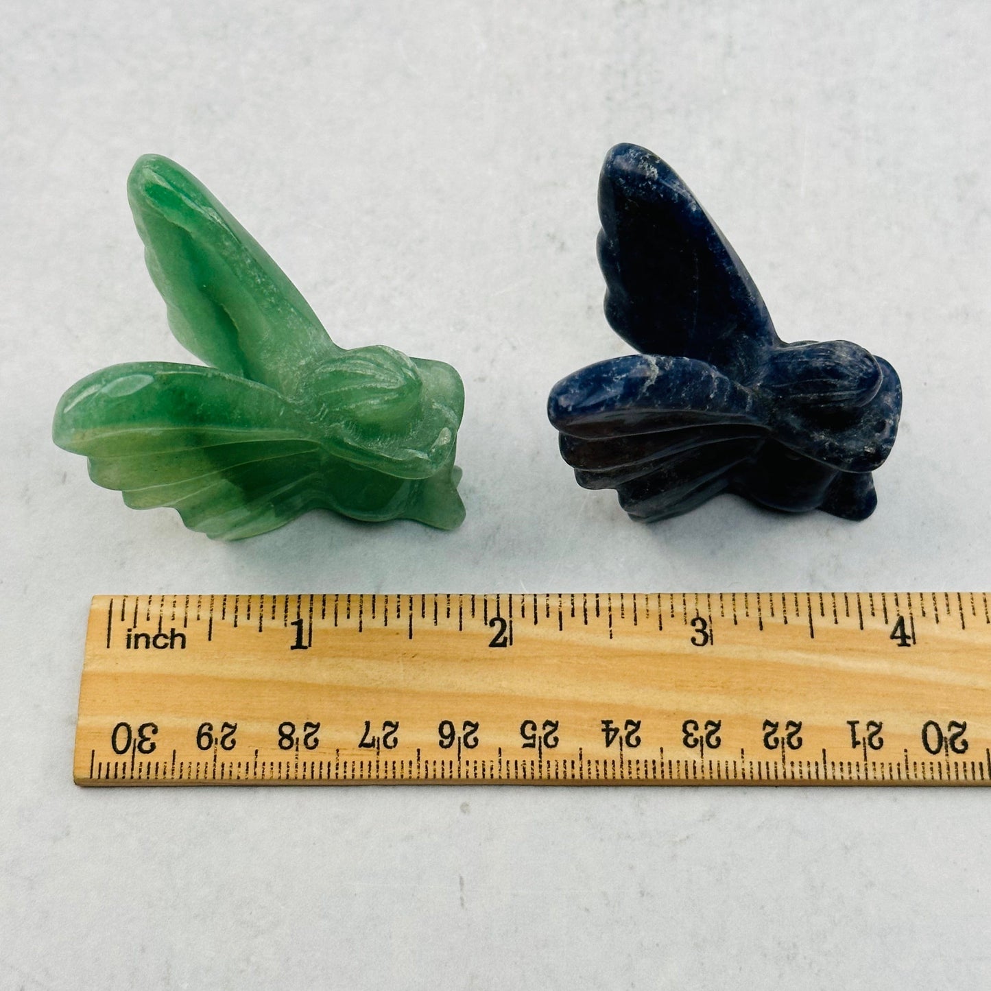 fairy next to a ruler for size reference 