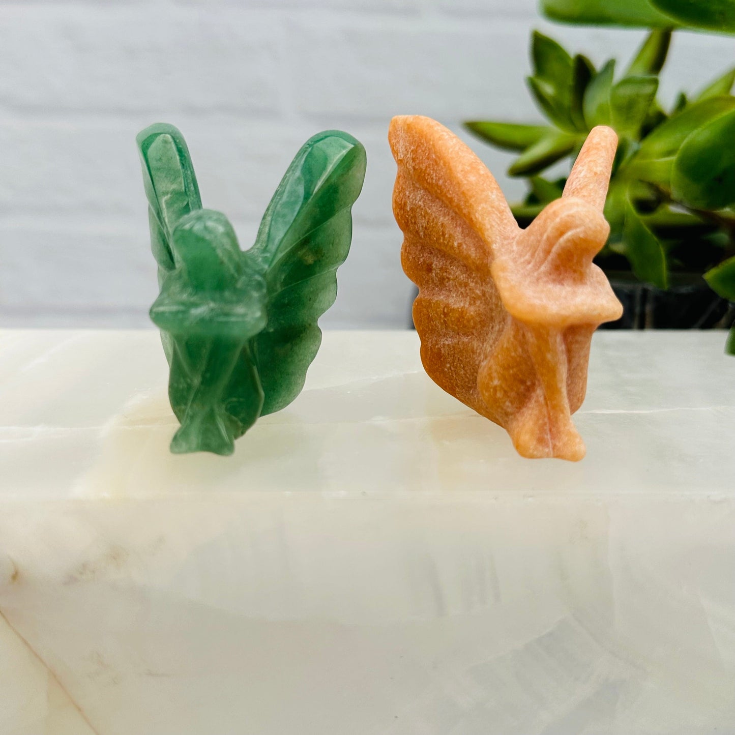 close up of the details on the carved gemstone fairies 