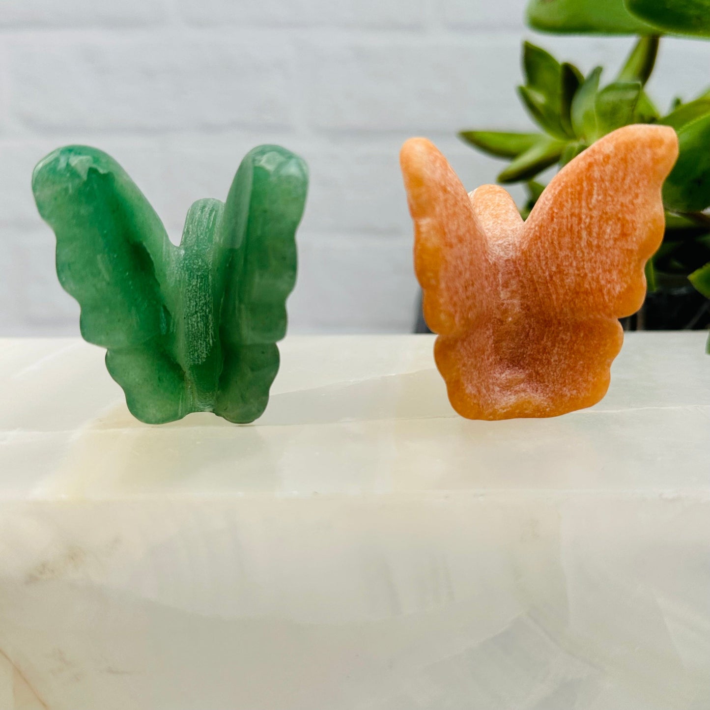 close up of the details on the carved gemstone fairies