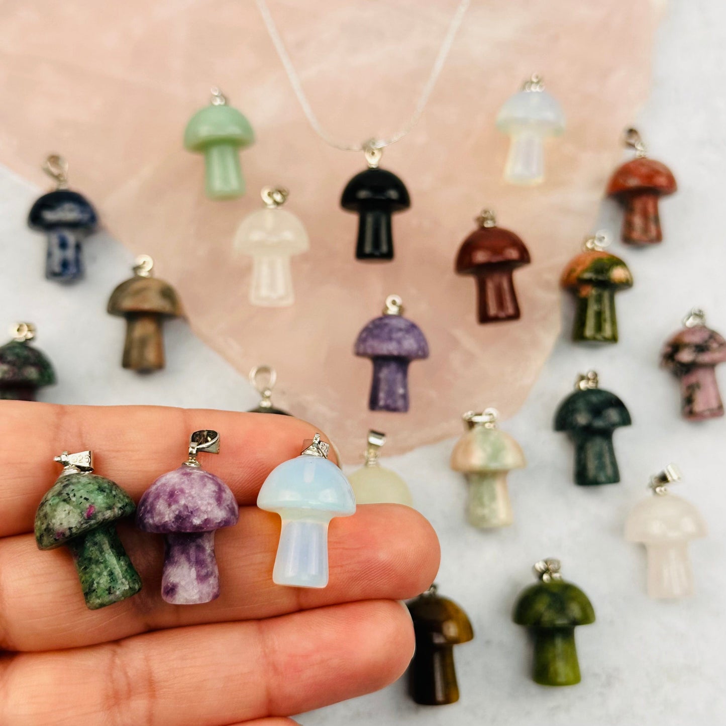 Gemstone Mushroom Pendant with Silver Bail in hand for size reference 