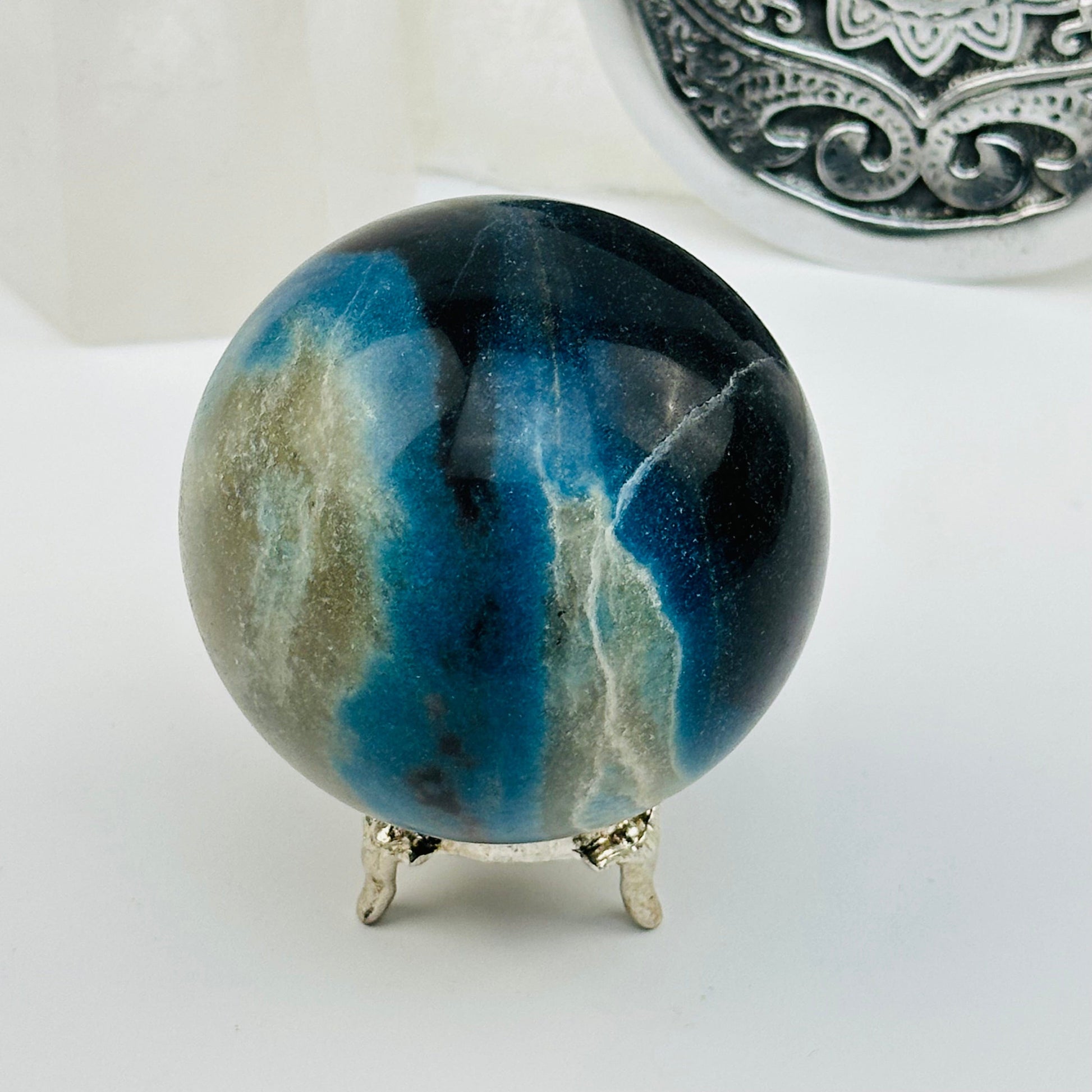 close up of the details on this crystal sphere 
