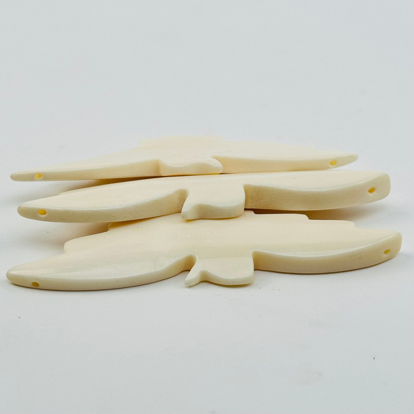 beads are drilled on the wing ends 