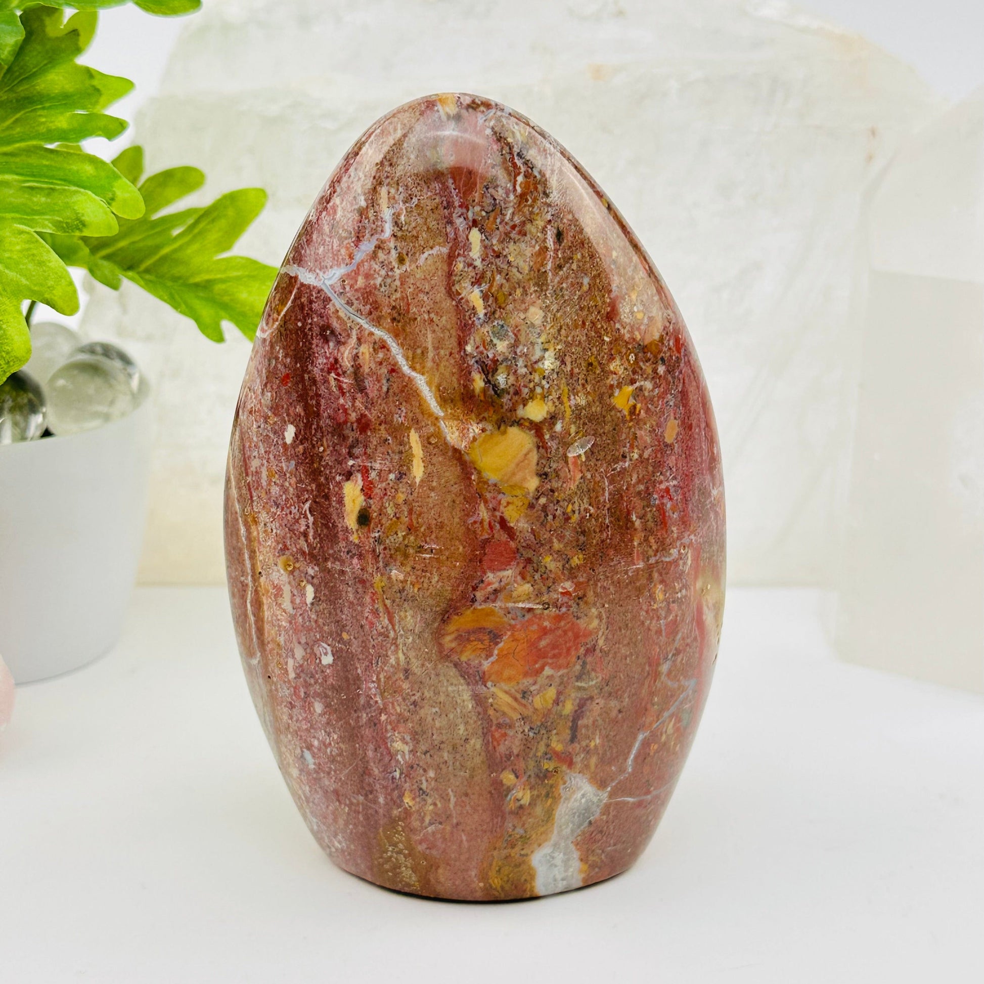 ocean jasper polished crystal cut base displayed as home decor 
