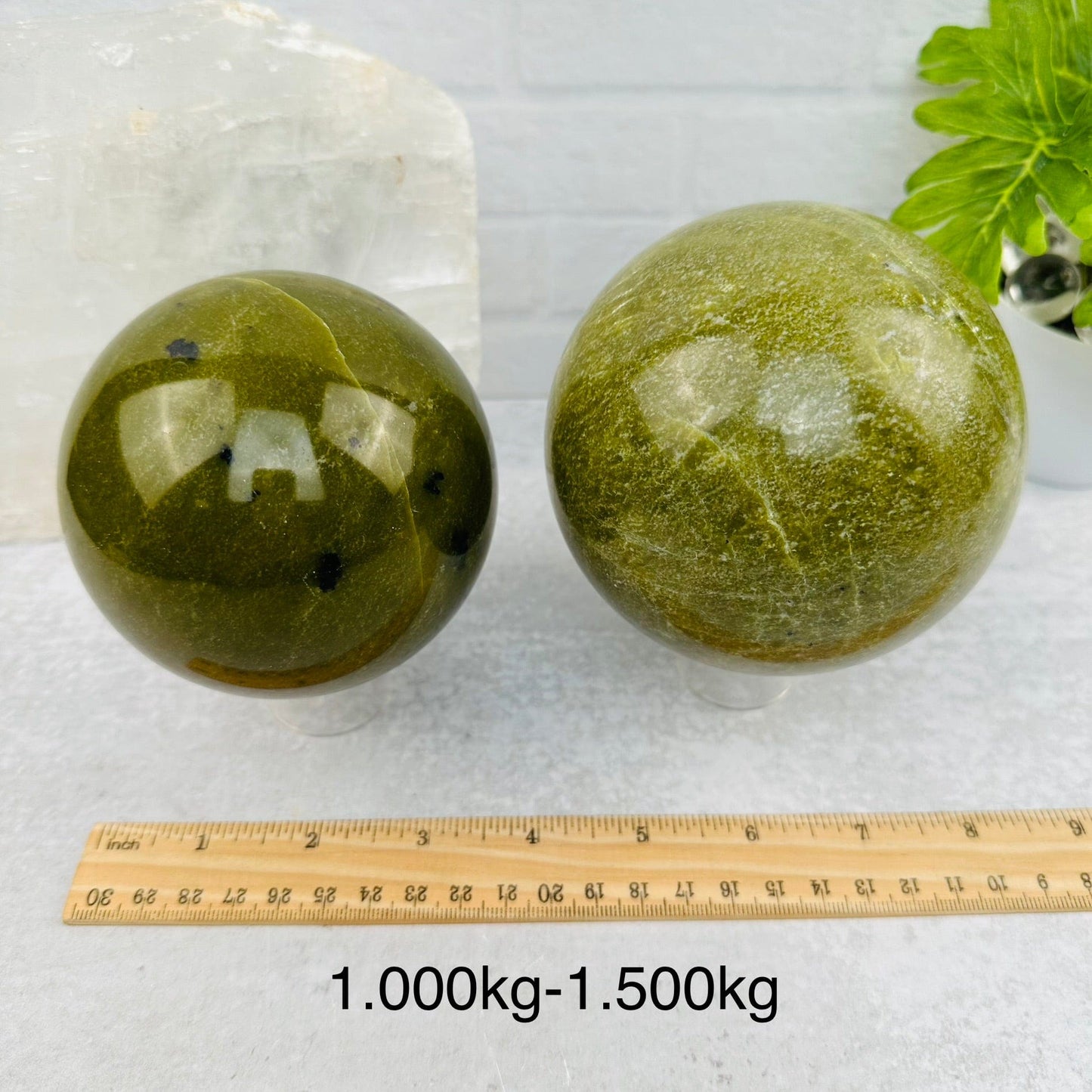 Green Jade Polished Spheres - BY WEIGHT - next to a ruler for size reference