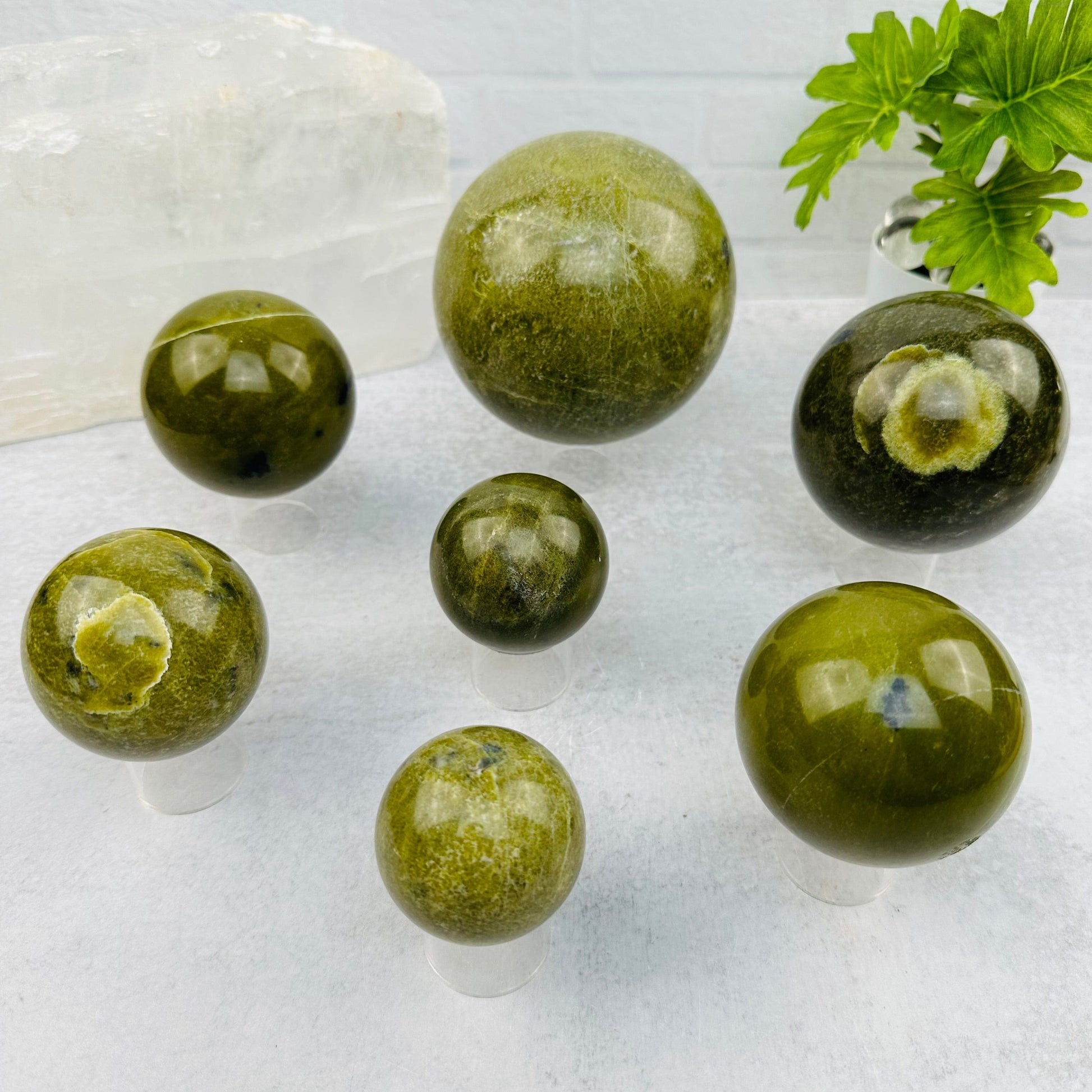 multiple spheres displayed to show the differences in the sizes and color shades 