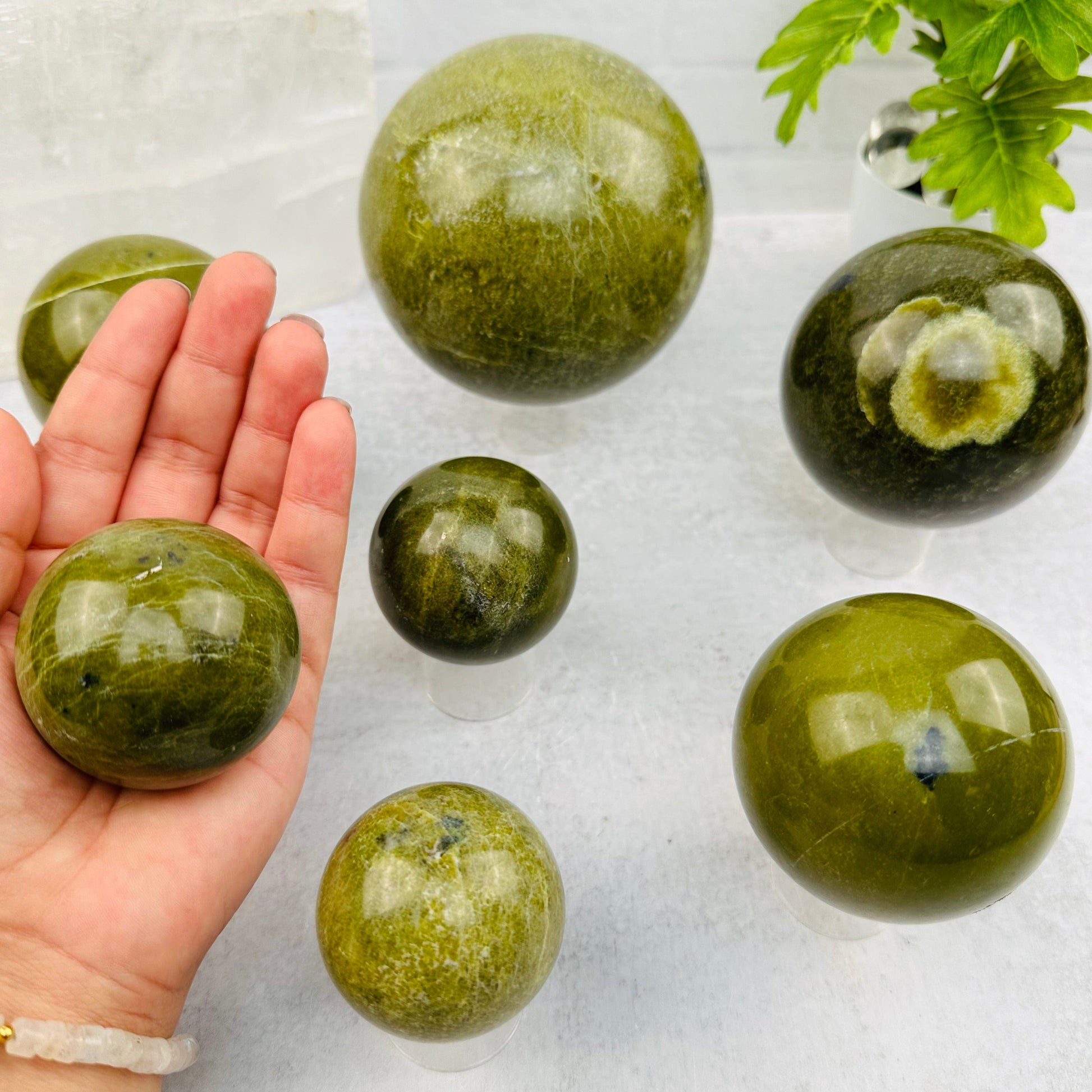 smaller sphere in hand for size reference 