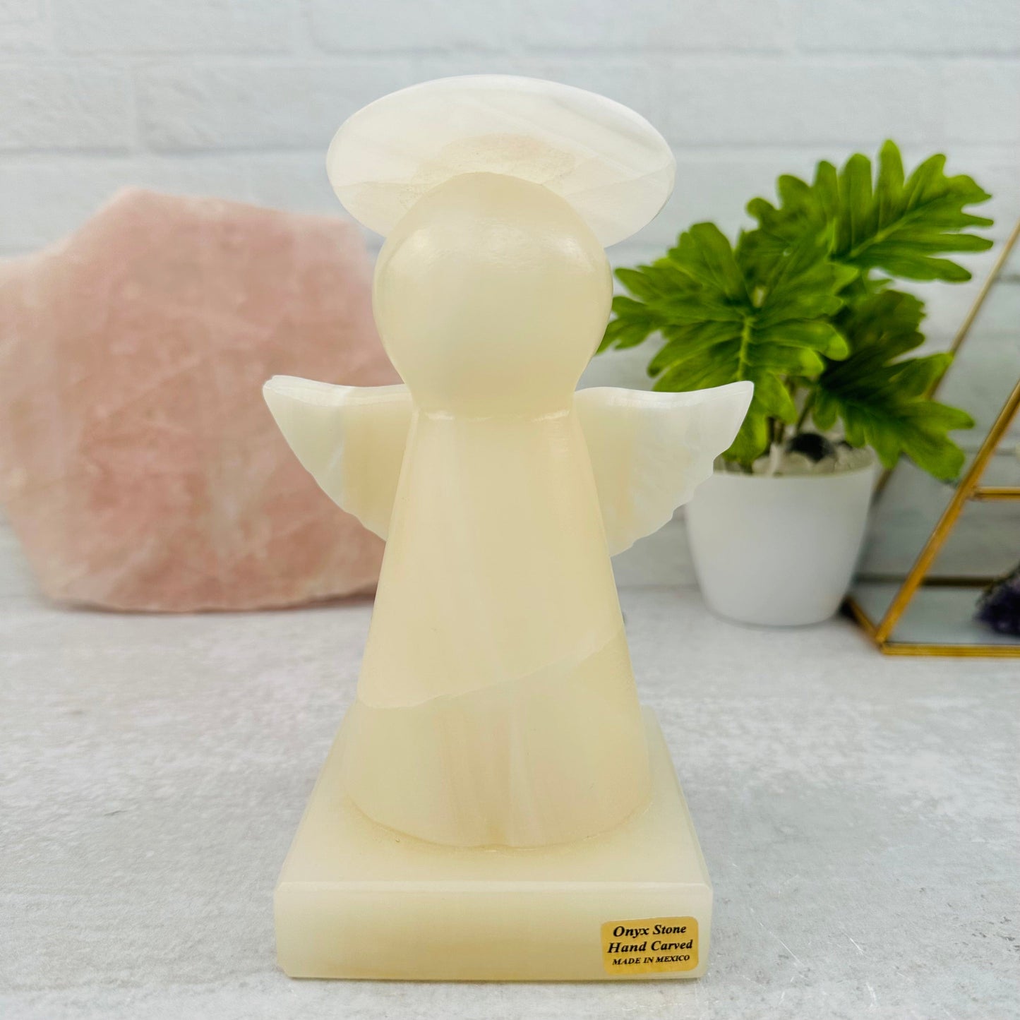 white onyx angel lamp displayed a home decor