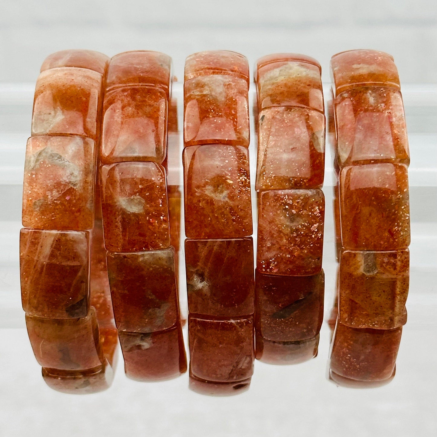 multiple bracelets displayed to show the differences in the color shades 