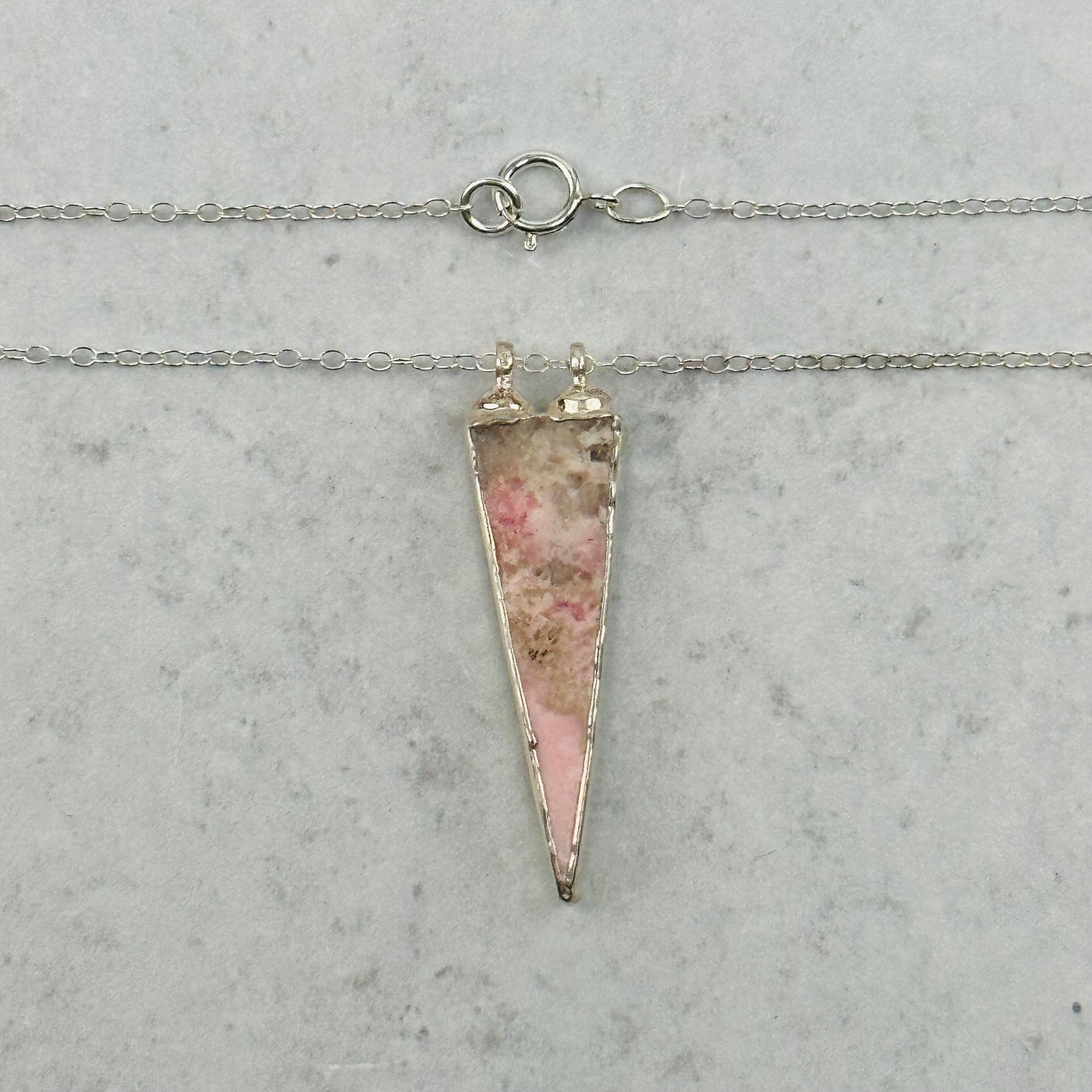 close up of the necklace clasp 