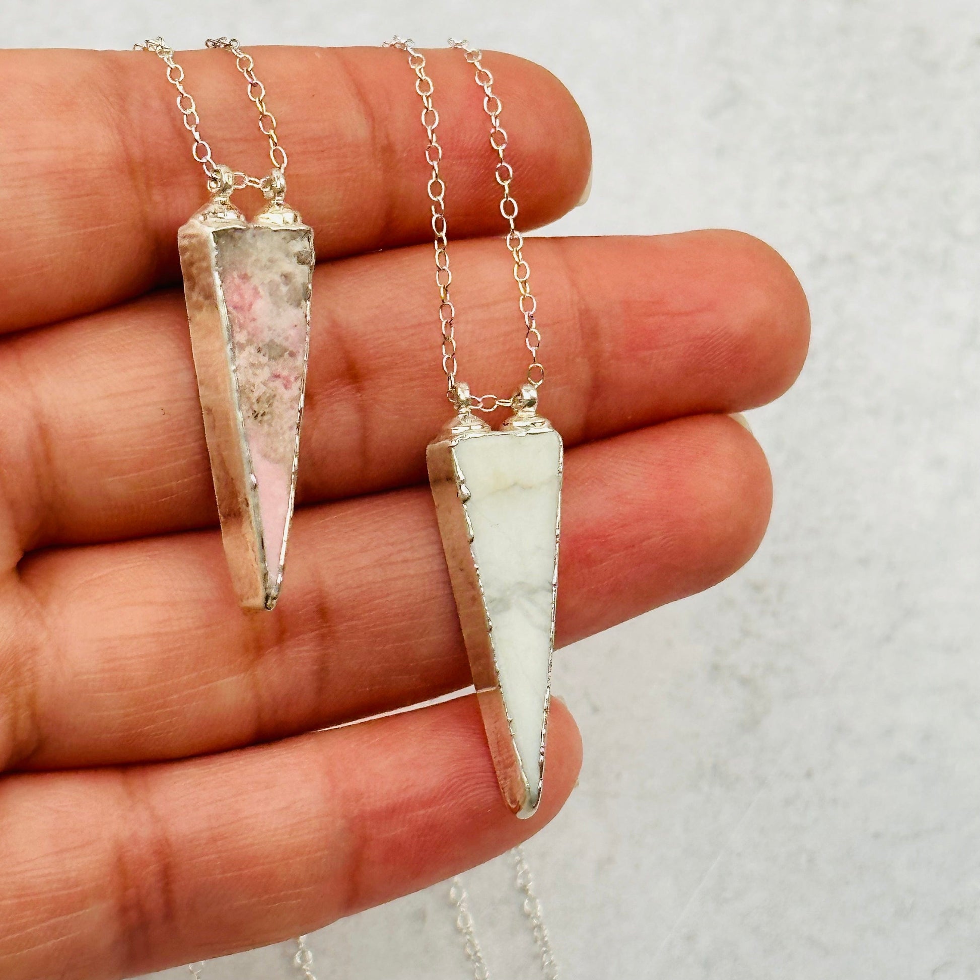 pendants in hand for size reference 