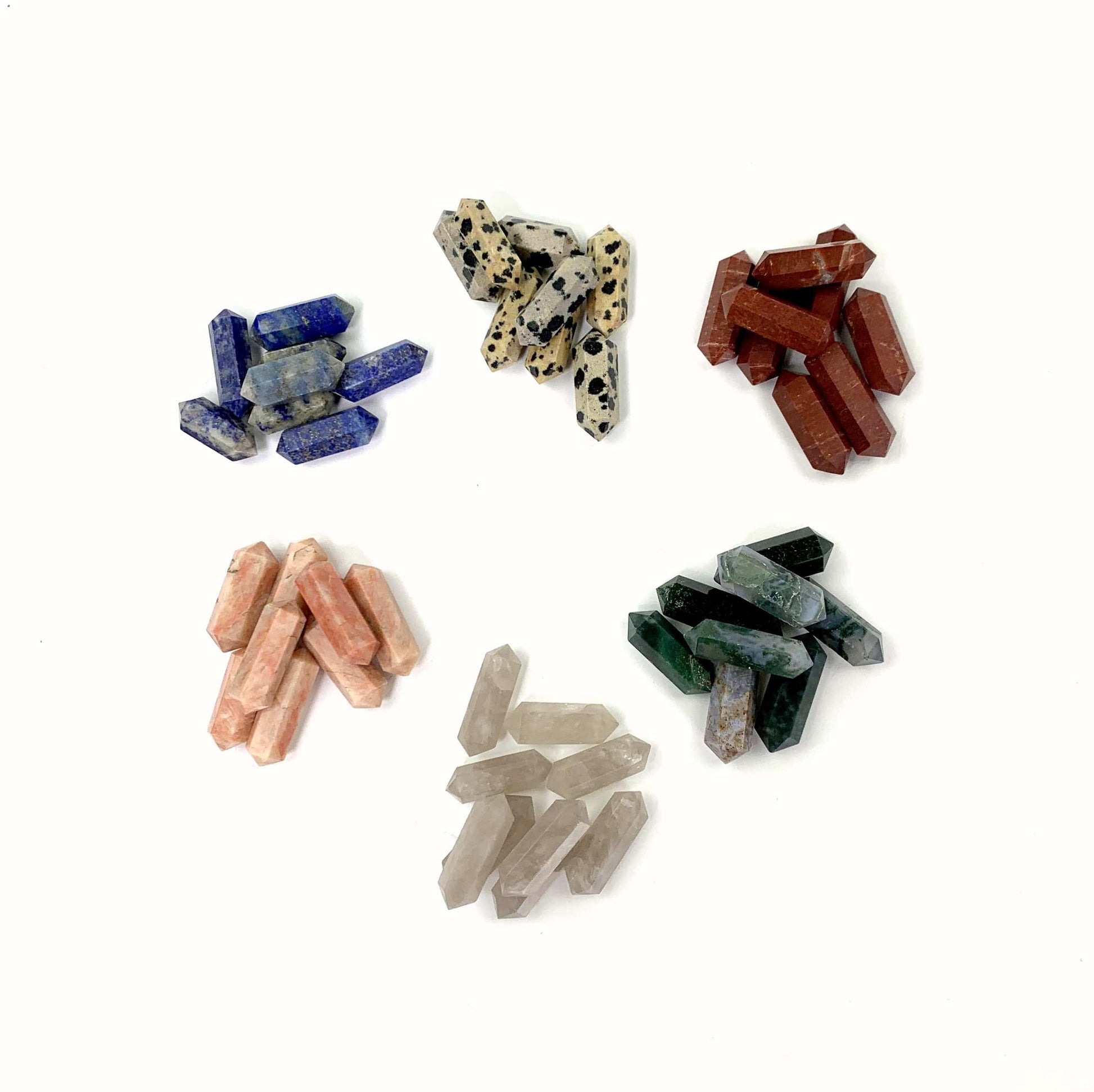 6 Piles of Gemstones on White Background.