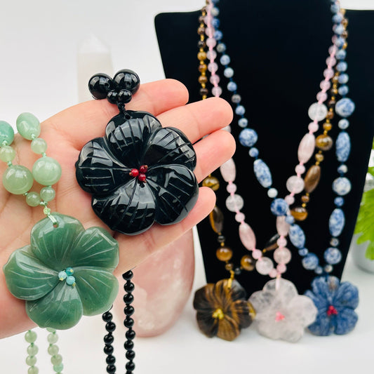 close up of the details on this gemstone glower necklace 