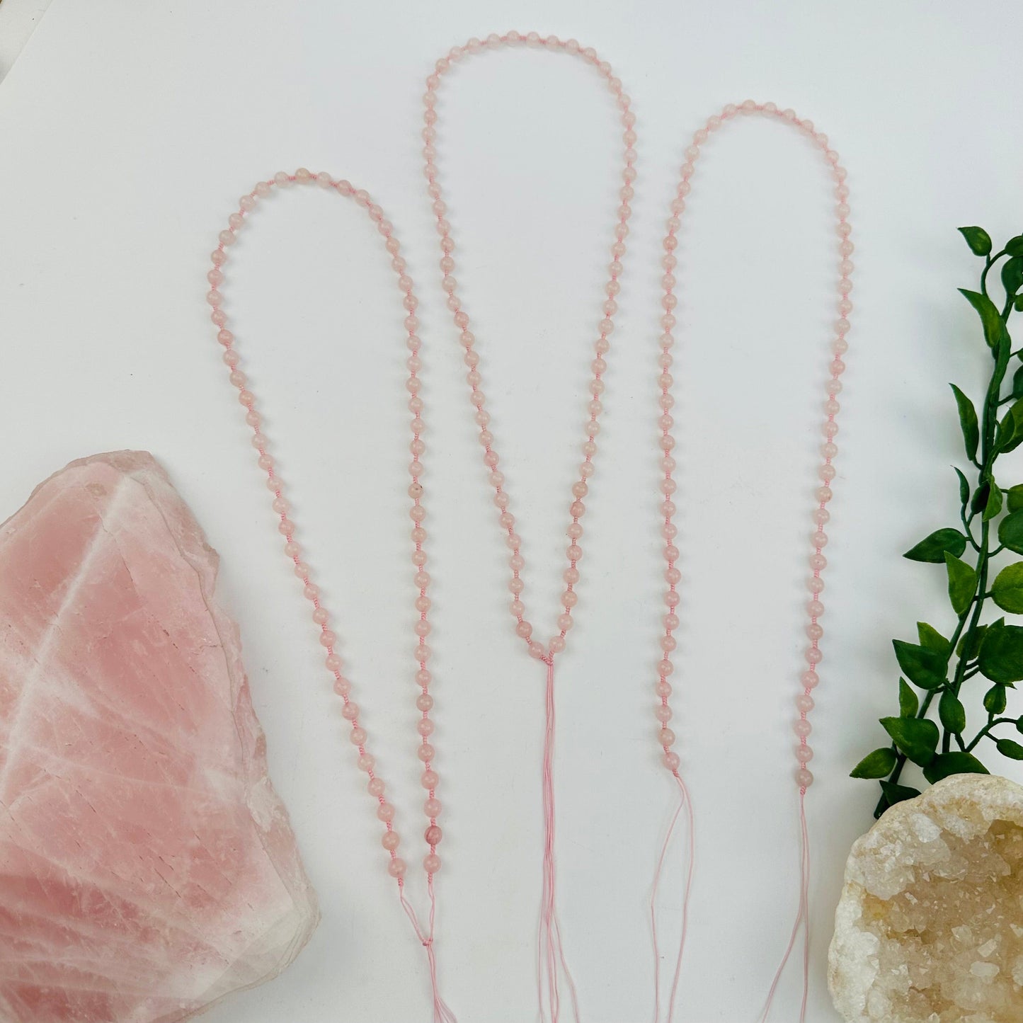 necklaces displayed to show that one side opens 