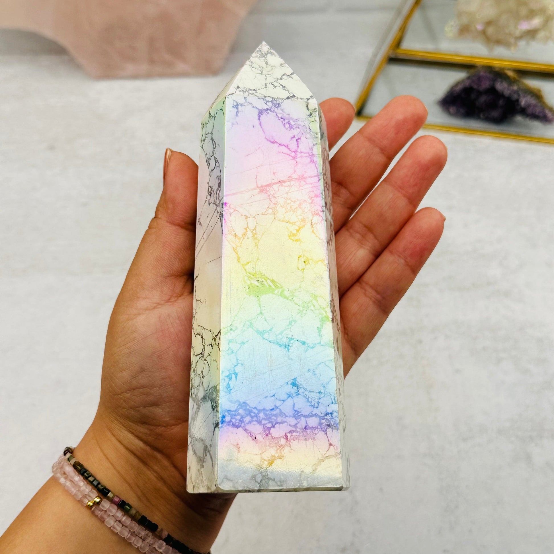polished point in hand for size reference 