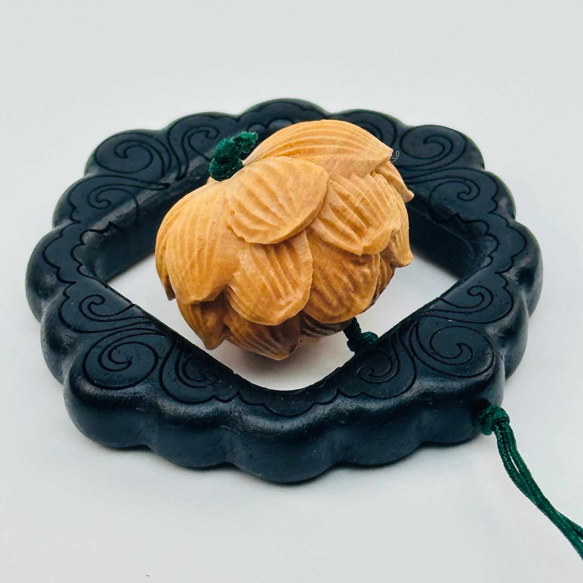close up of the details on this wooden charm 