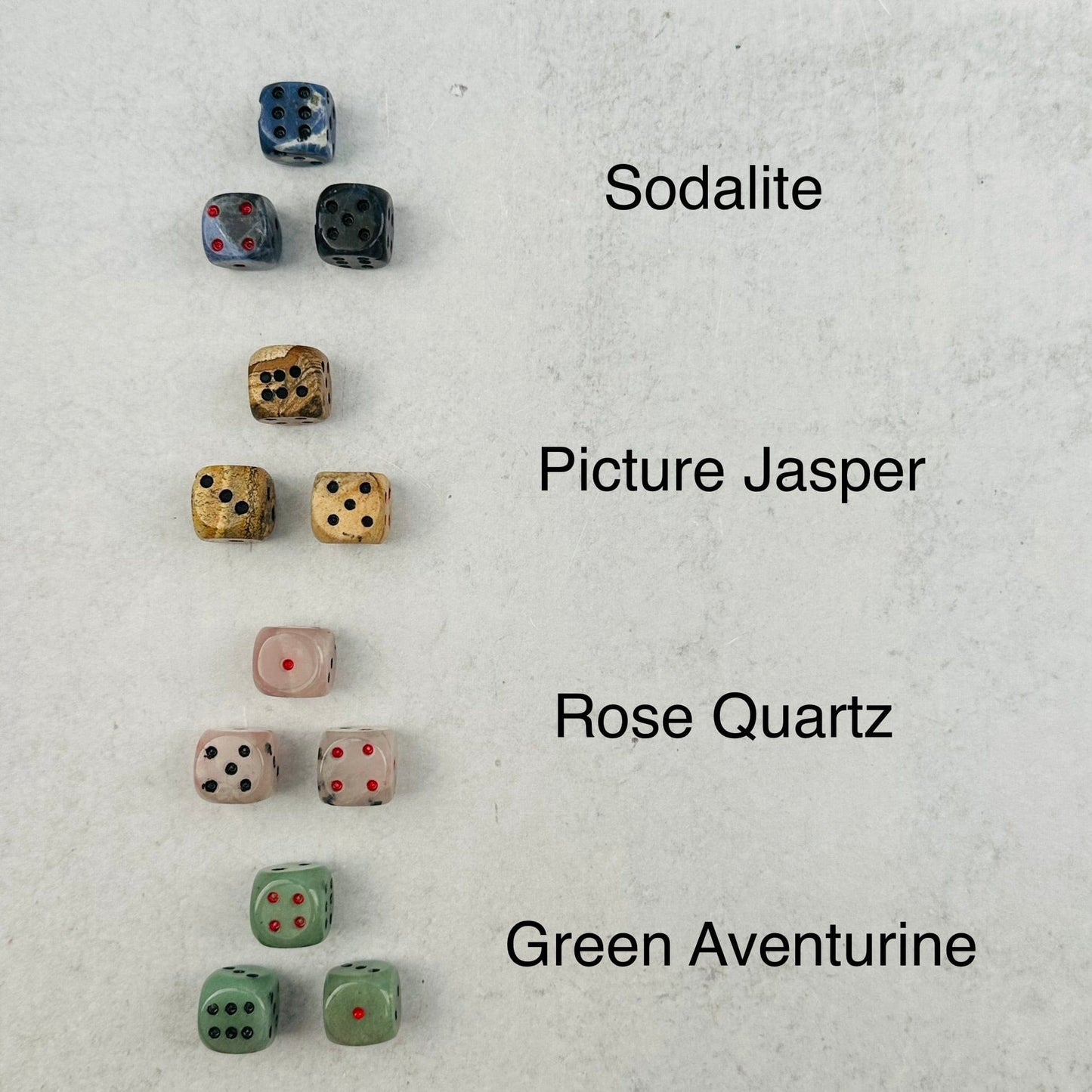 Gemstone Dice next to their crystal name 