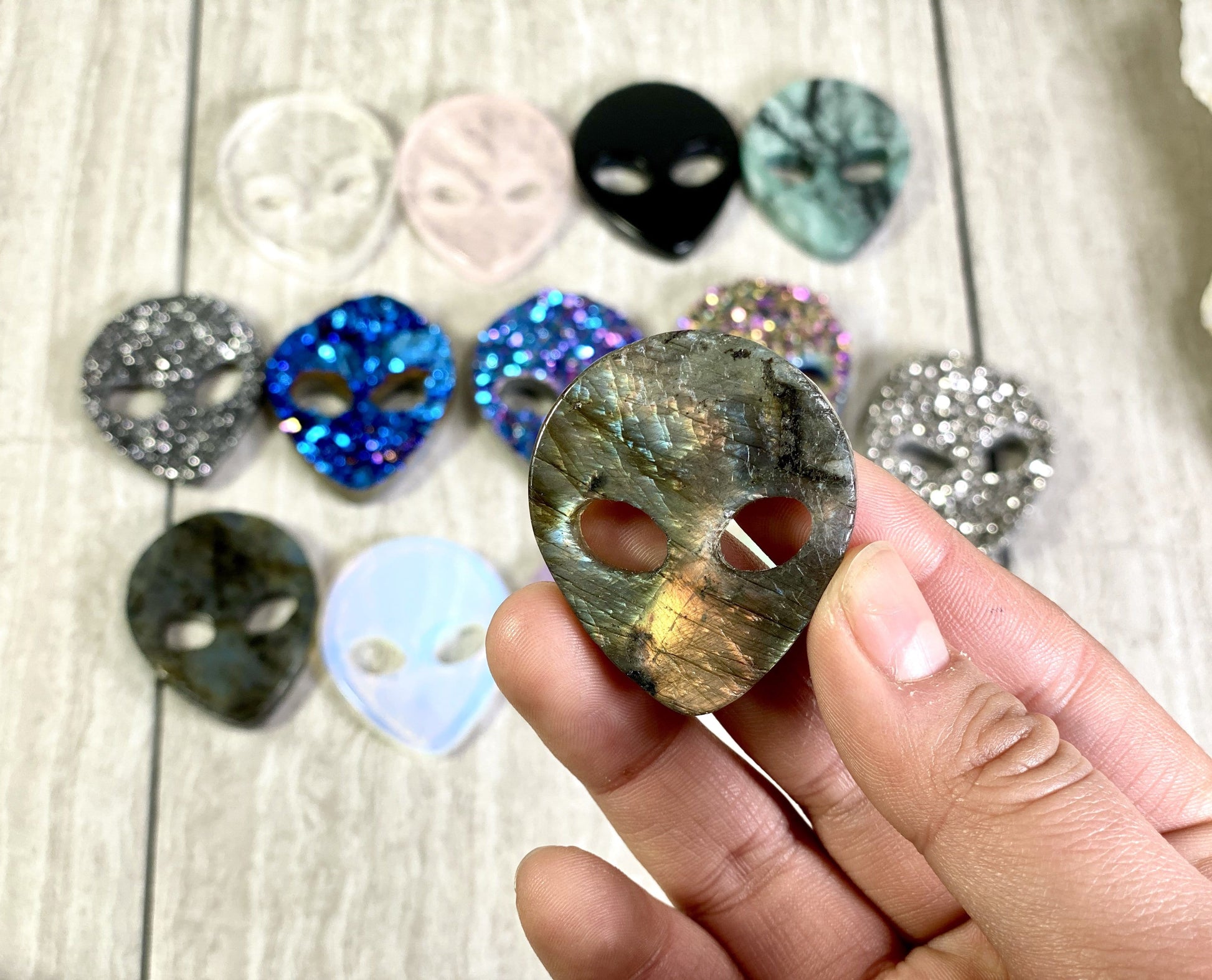 Alien Head Gemstones holded in Hand