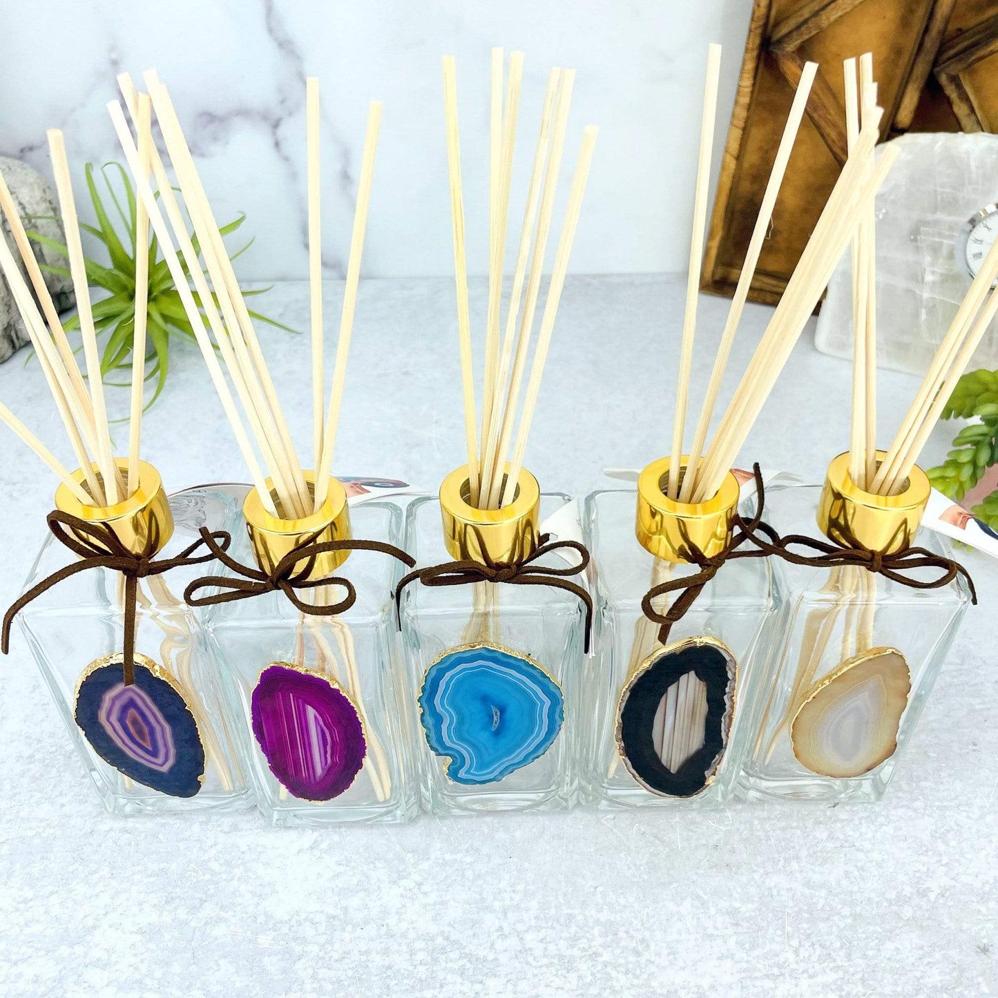 This Picture is showing all of the variety we have available for our Agate Slice Diffuser Bottles, from a top view.