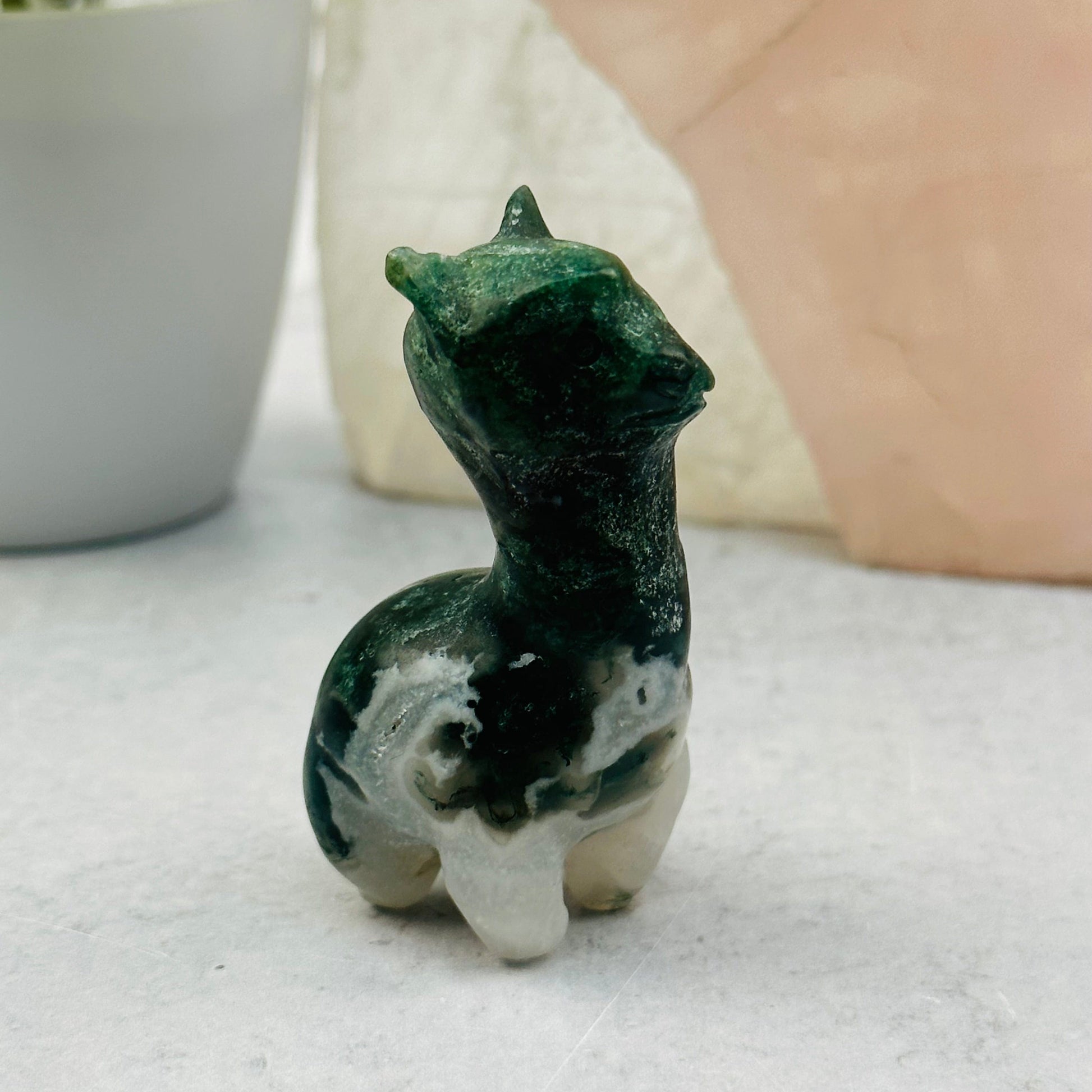 Carved Gemstone Alpaca displayed as home decor 
