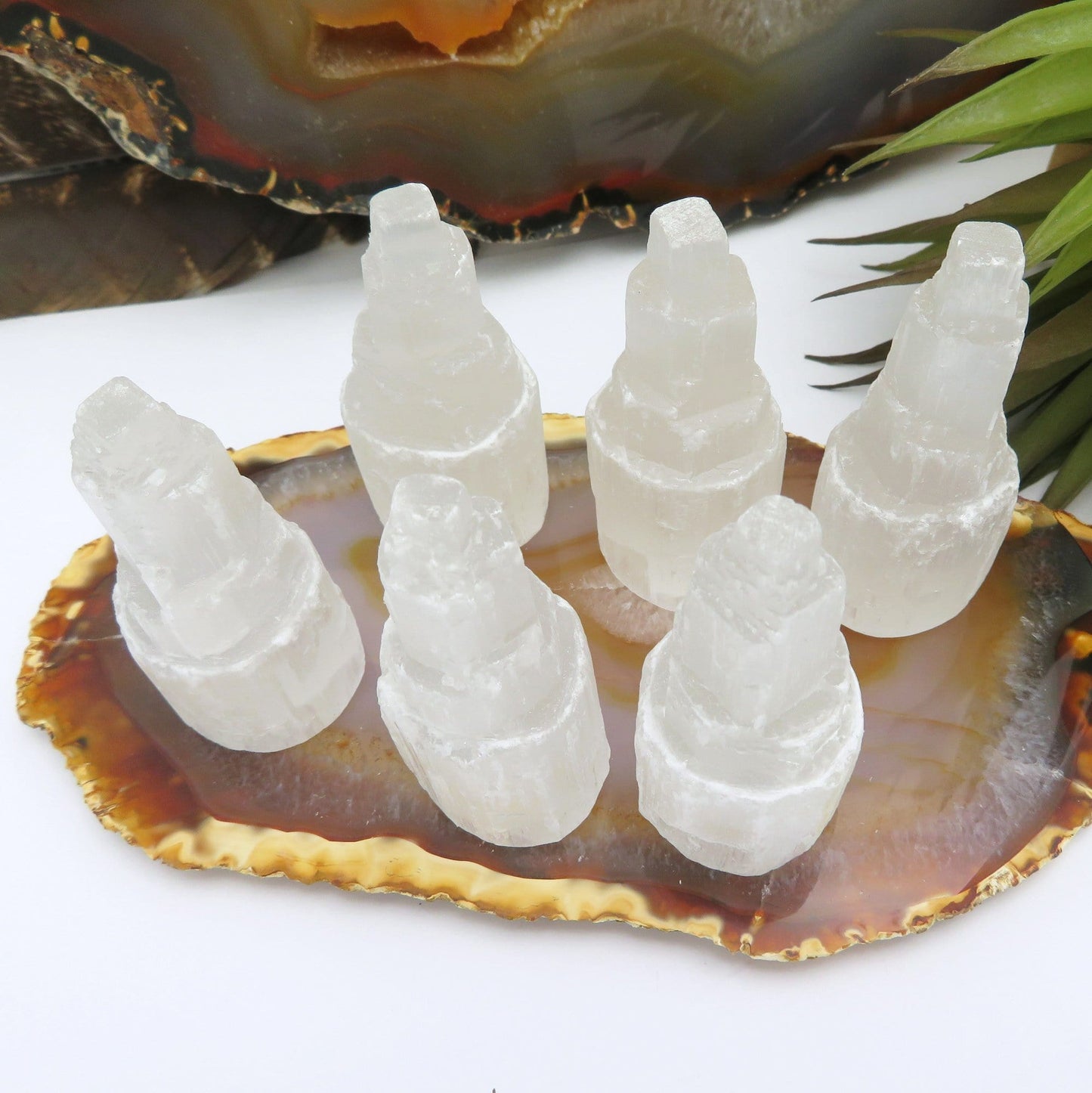 overhead view of selenite raw crystal towers on display for details