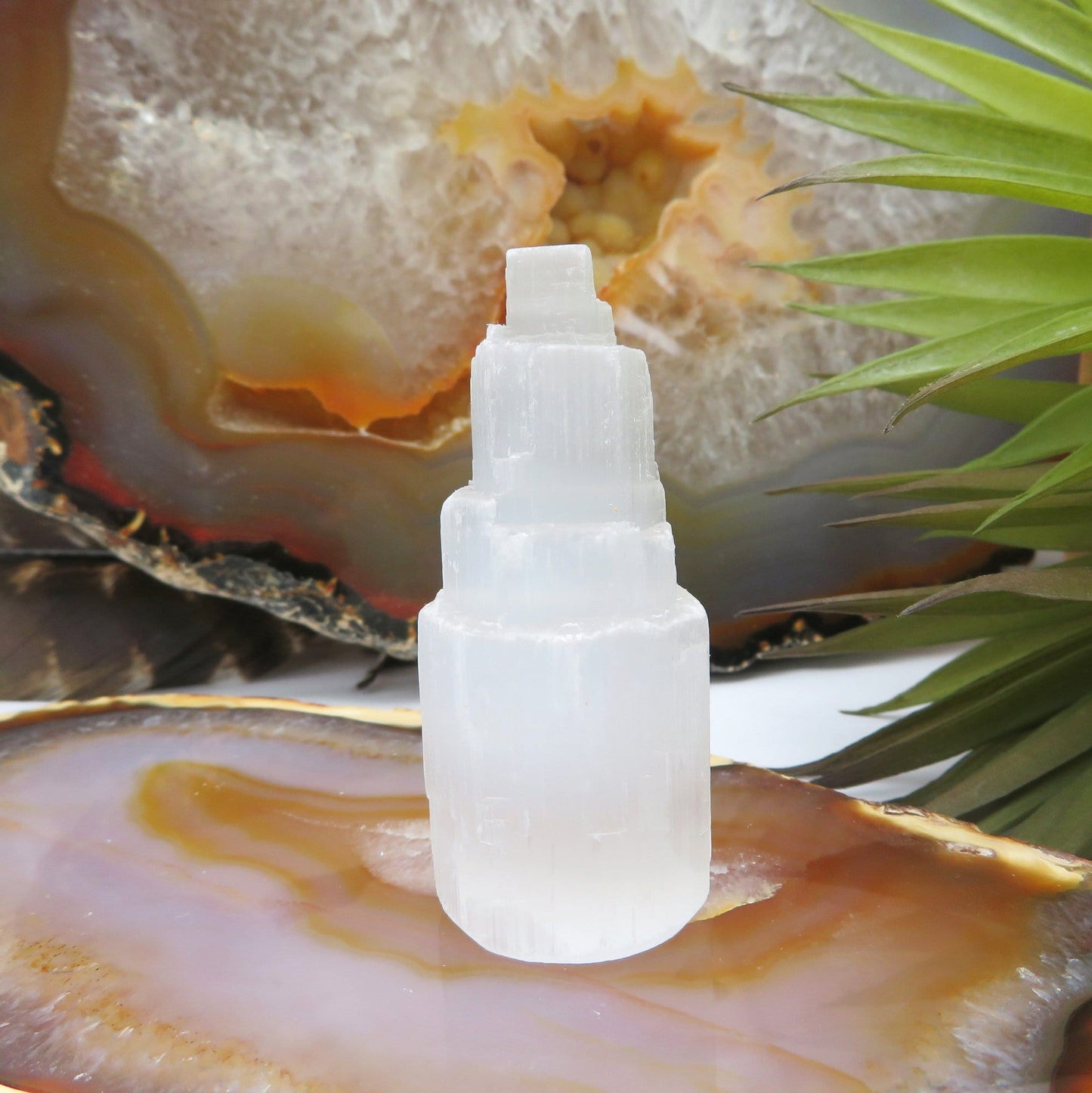 close up of one selenite raw crystal tower for details