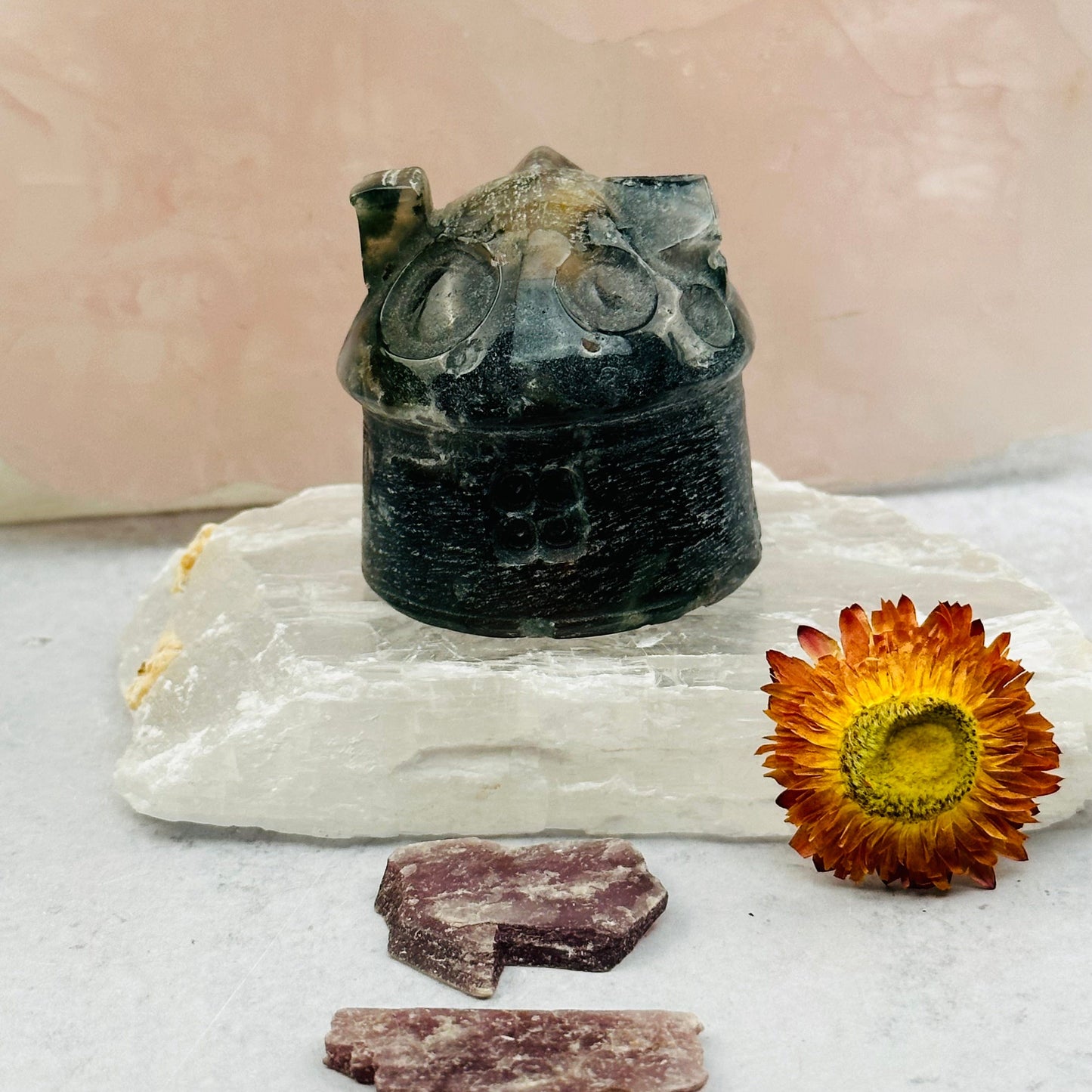 Carved Gemstone House displayed as home decor