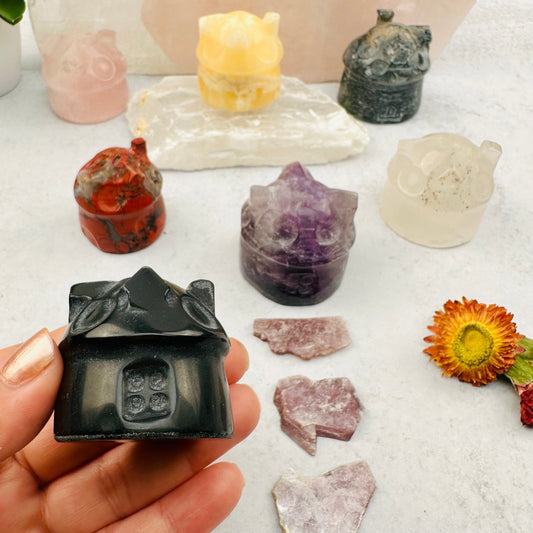 close up of the details on the carved gemstone house 