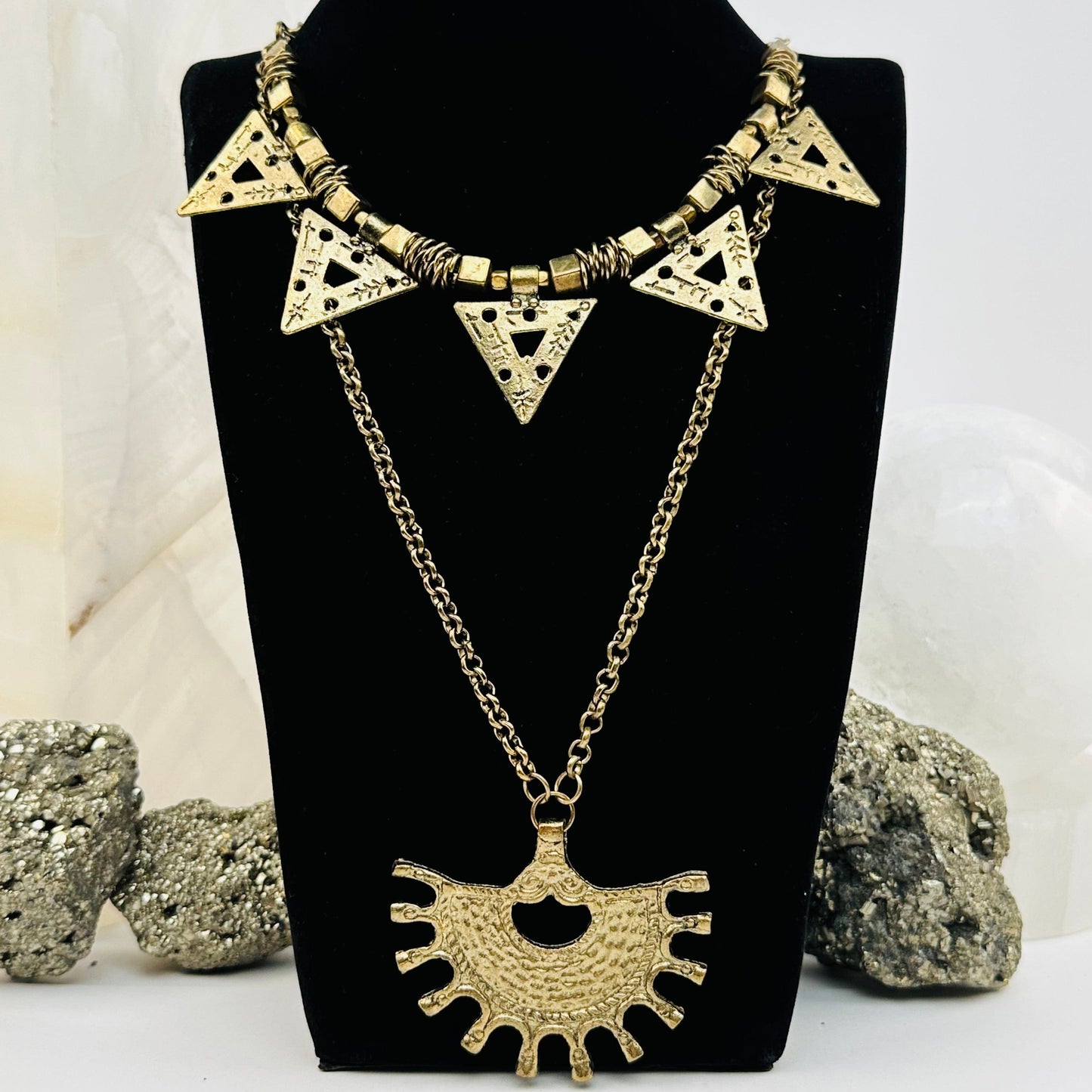 brass chain necklace displayed to show the layered style 