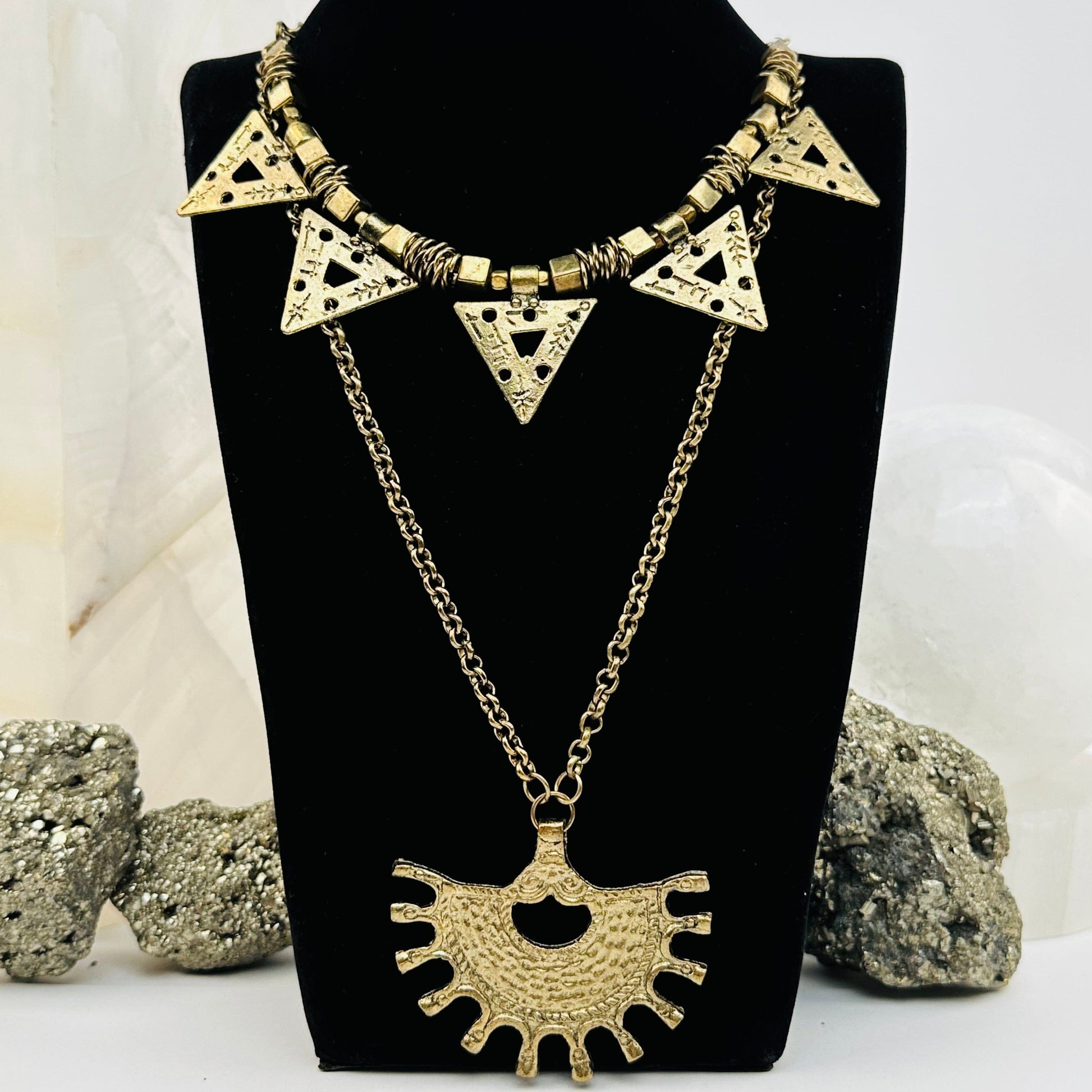 brass chain necklace displayed to show the layered style 