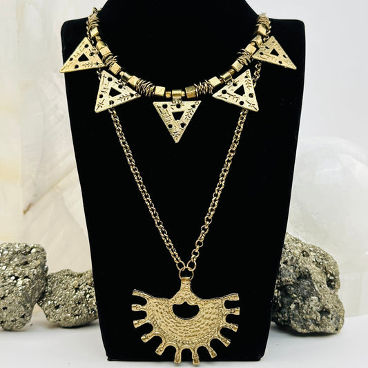 brass chain necklace displayed to show the layered style 