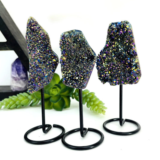 titanium crystal on metal stand set as home decor 