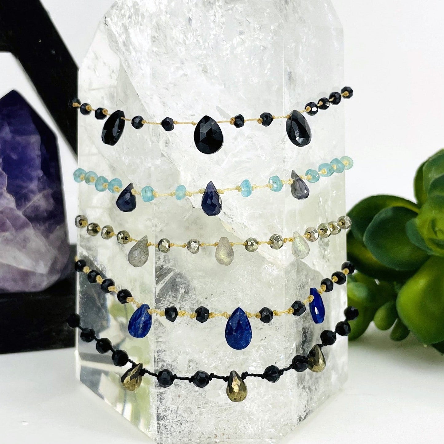 close up of bracelets on a point