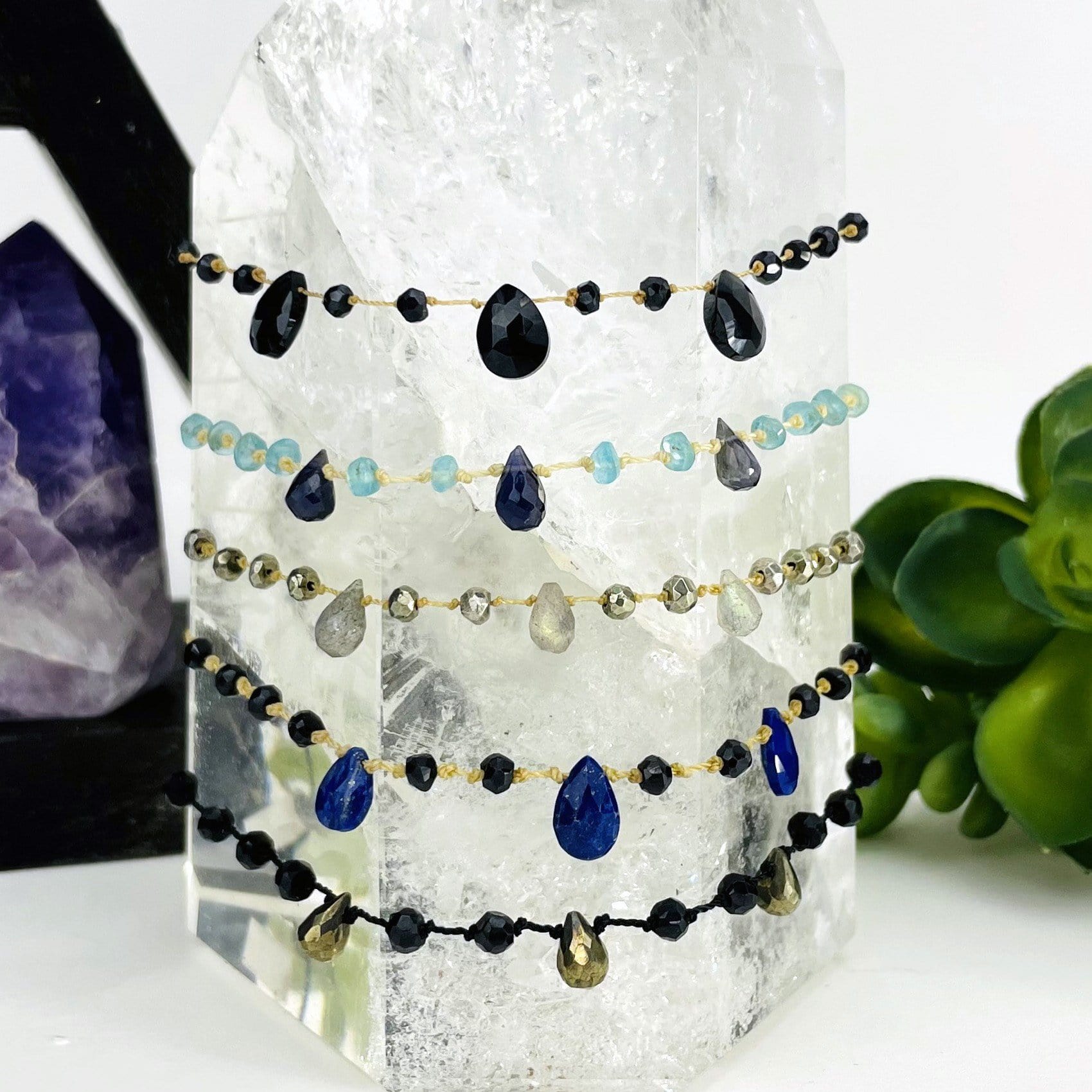 close up of bracelets on a point