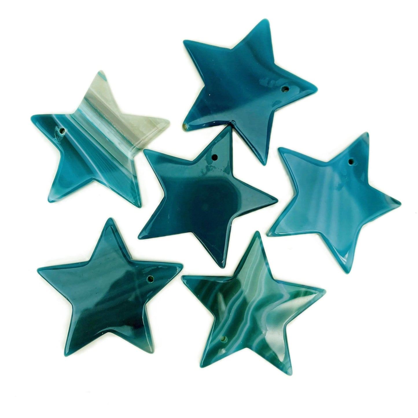 6 Teal Drilled Agate Star on White Background.
