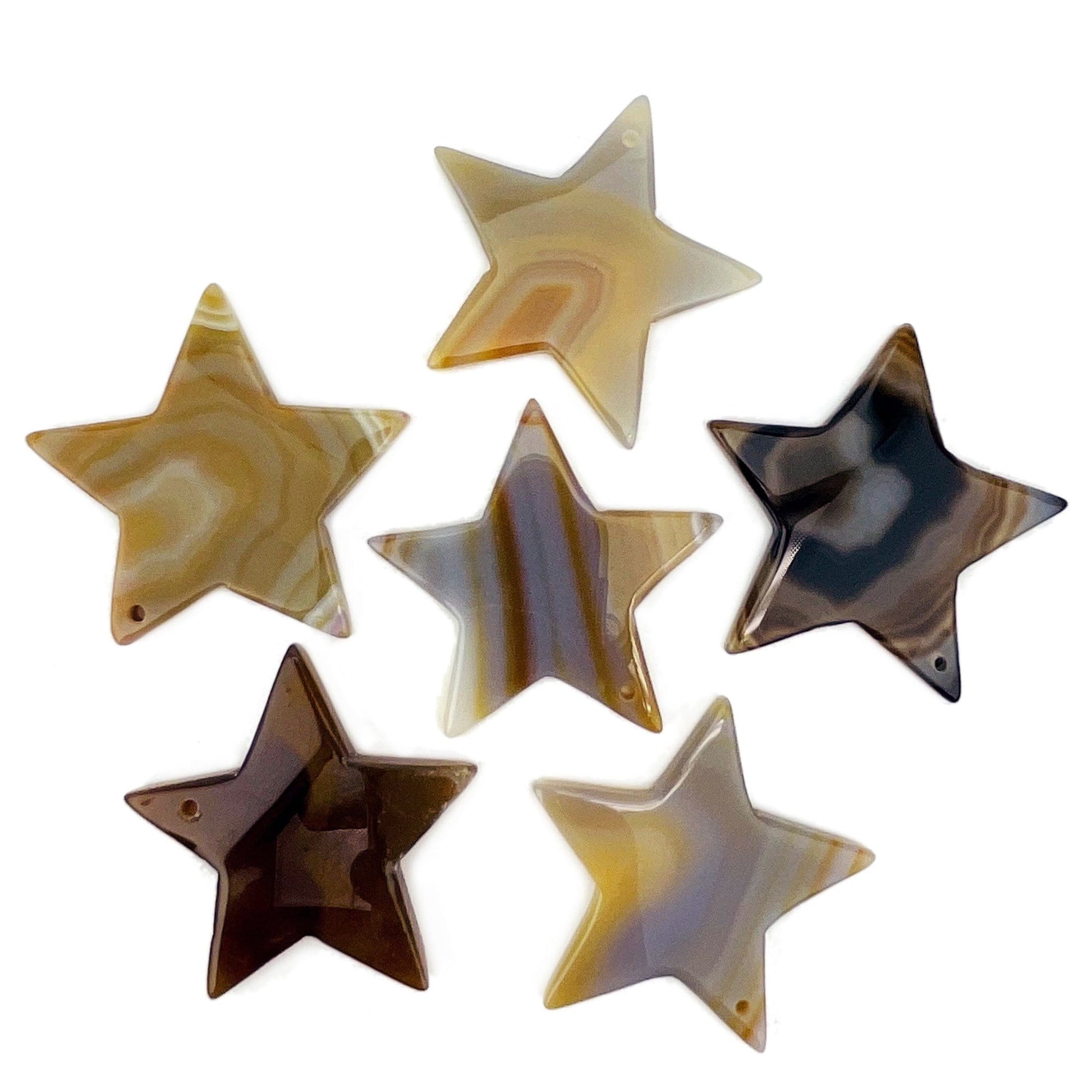 6 Natural Drilled Agate Star on White Background.