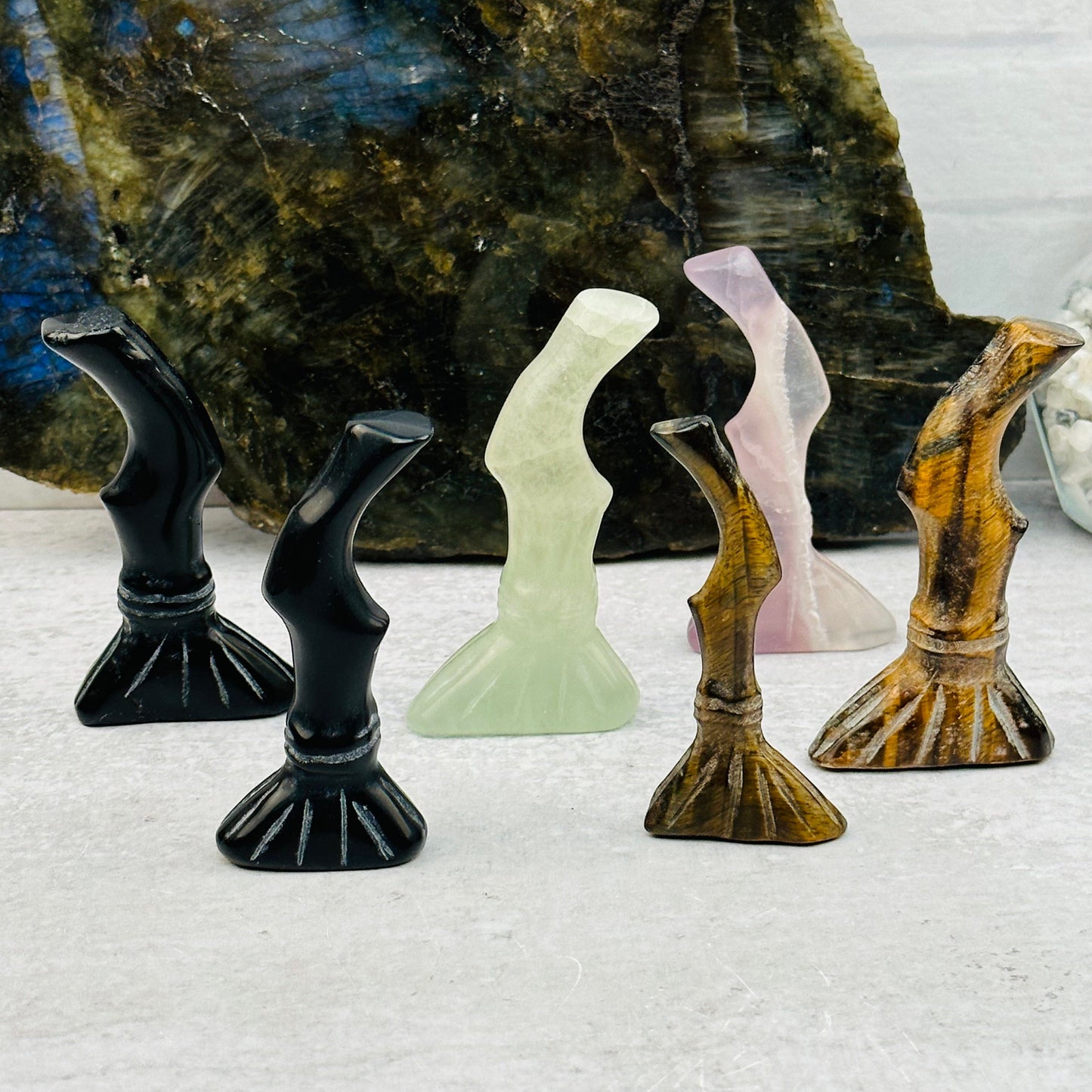 multiple Carved Gemstone Brooms displayed to show the differences in the color shades and sizes 