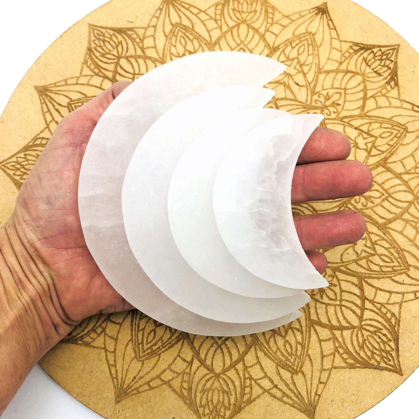 moon slices in hand for size reference 