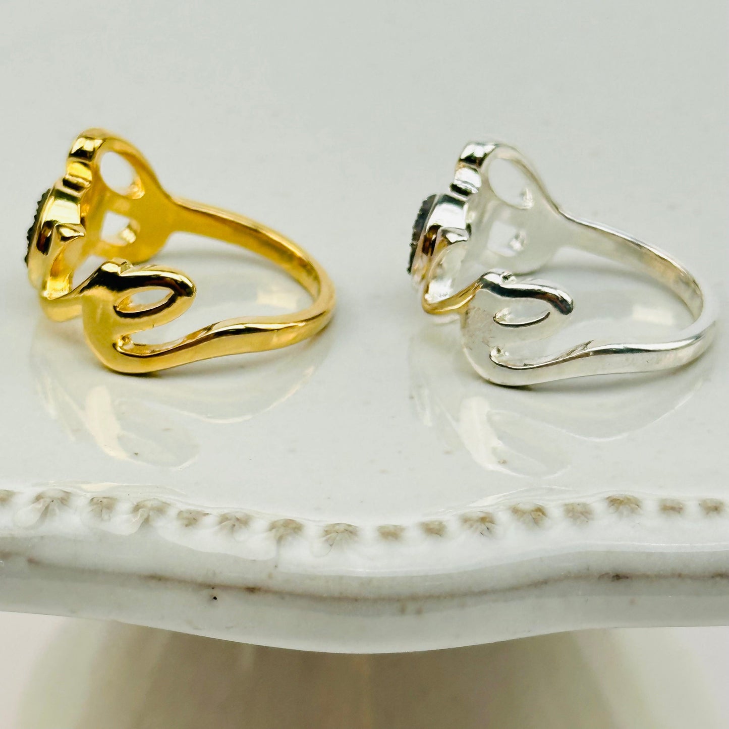 close up of the details on these crystal druzy rings 