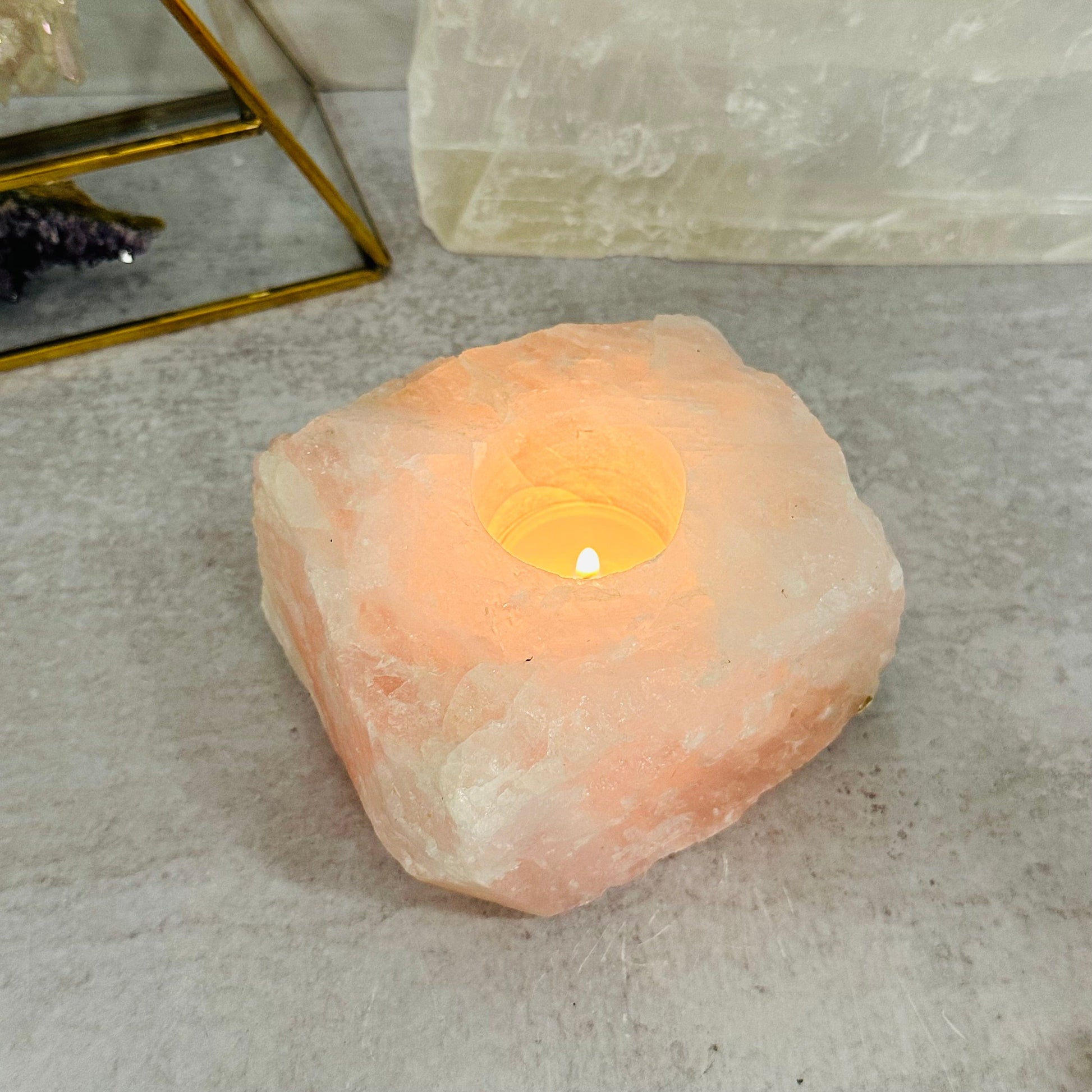rose quartz candle holder displayed as home decor 