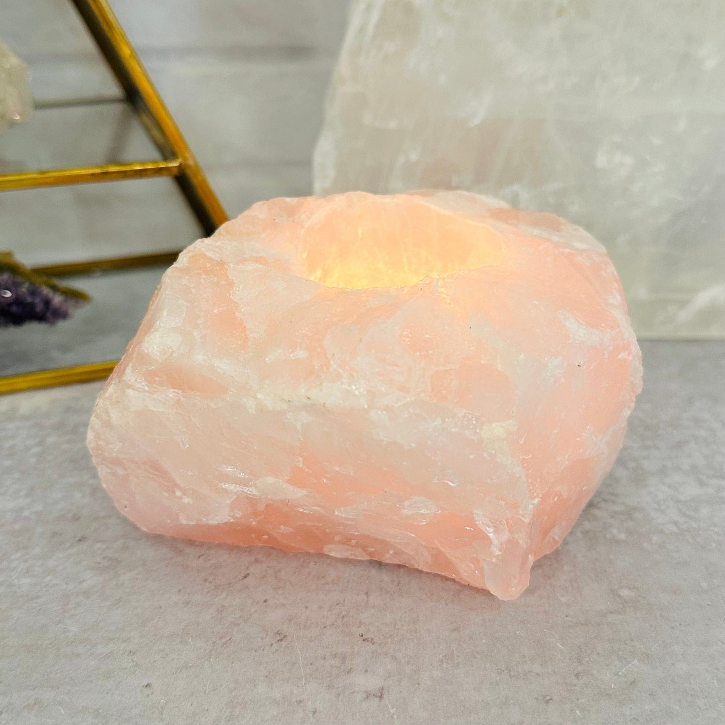 rose quartz candle holder displayed as home decor