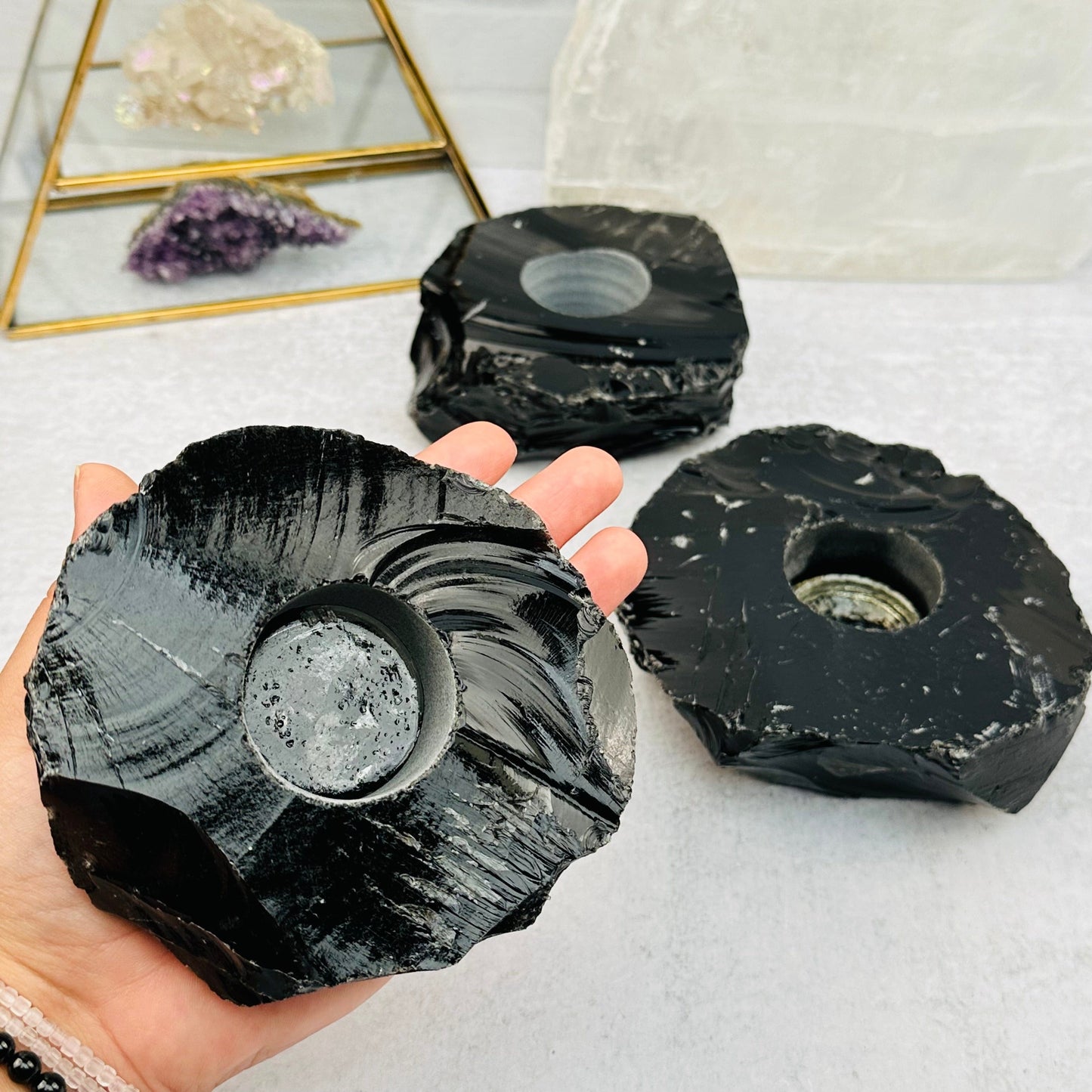 Obsidian Candle Holder in hand for size reference 