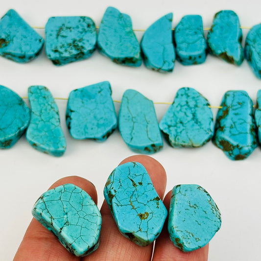close up of the details on these turquoise crystal beads 