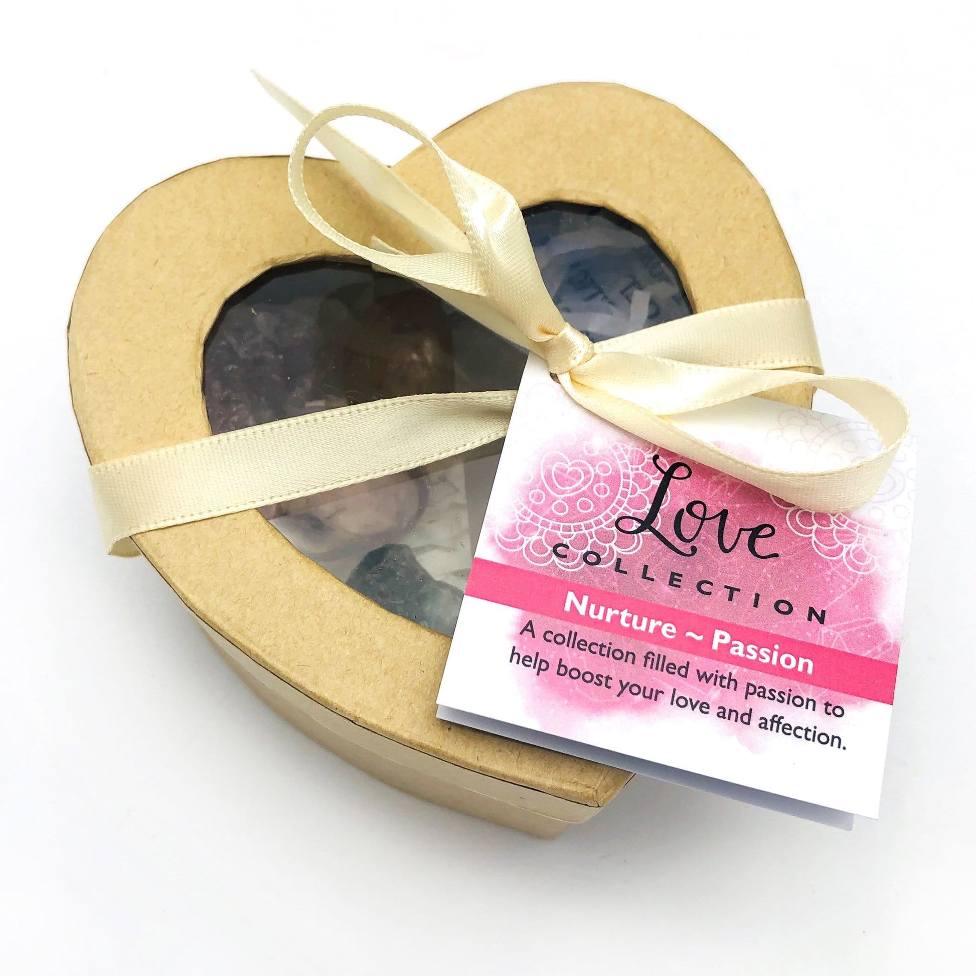 Crystal Healing Love Set of Stones in Heart Shaped Box  on a table