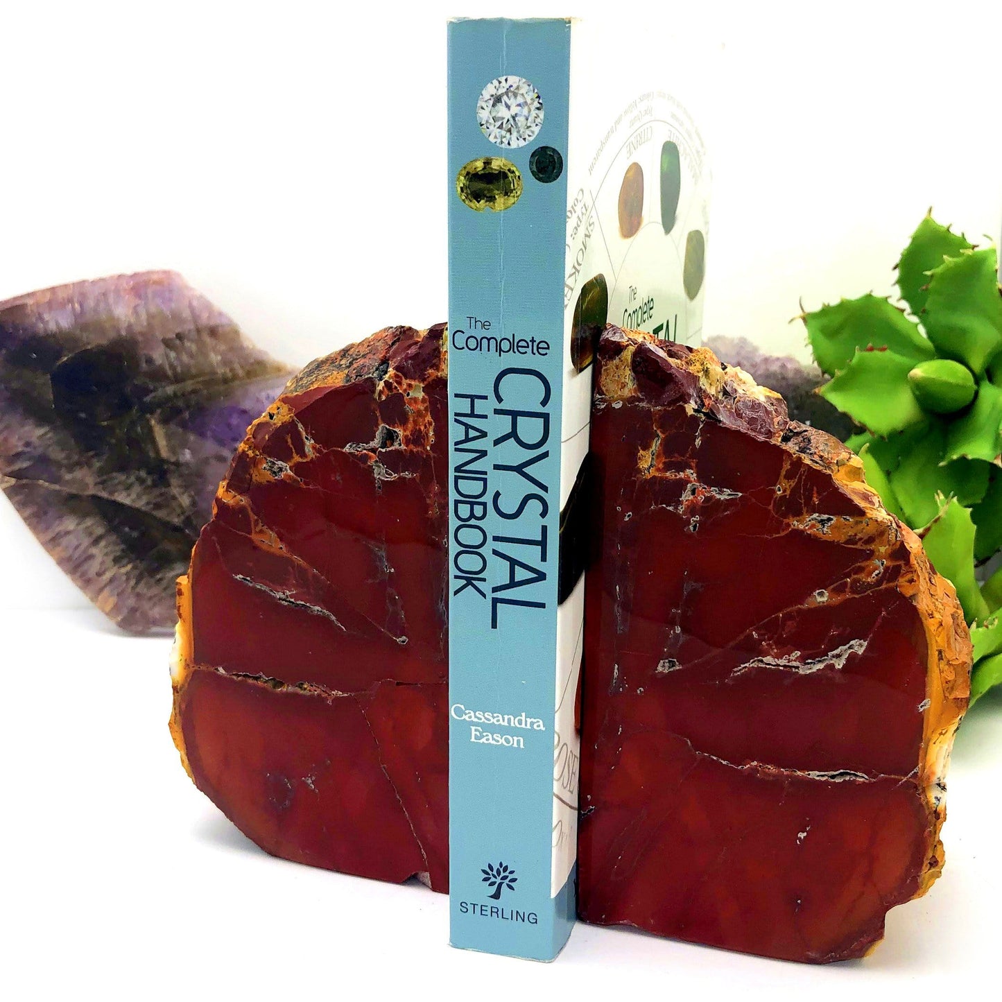 red tone Mookaite Bookend displayed with book in the center