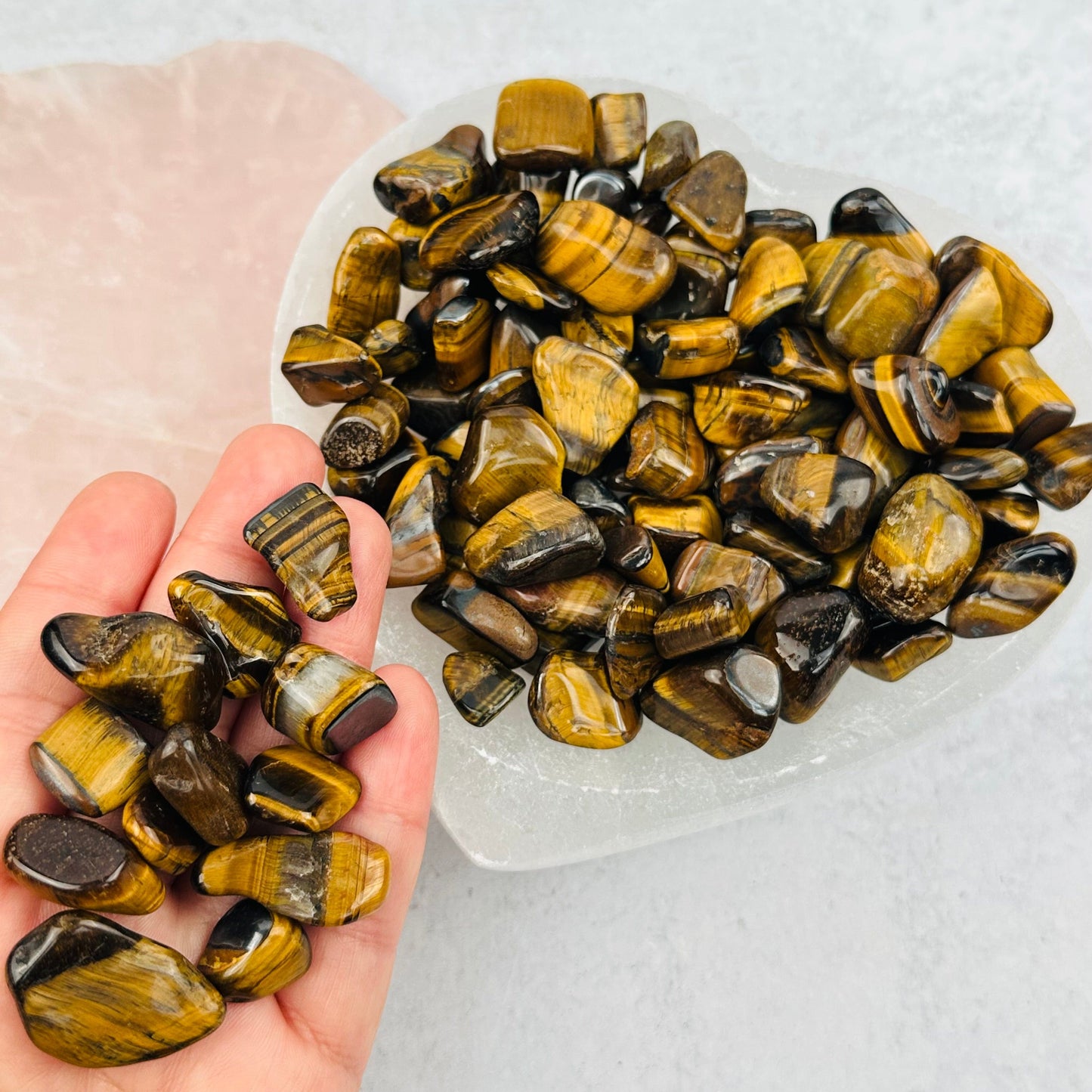 tumbled stones in hand for size reference 