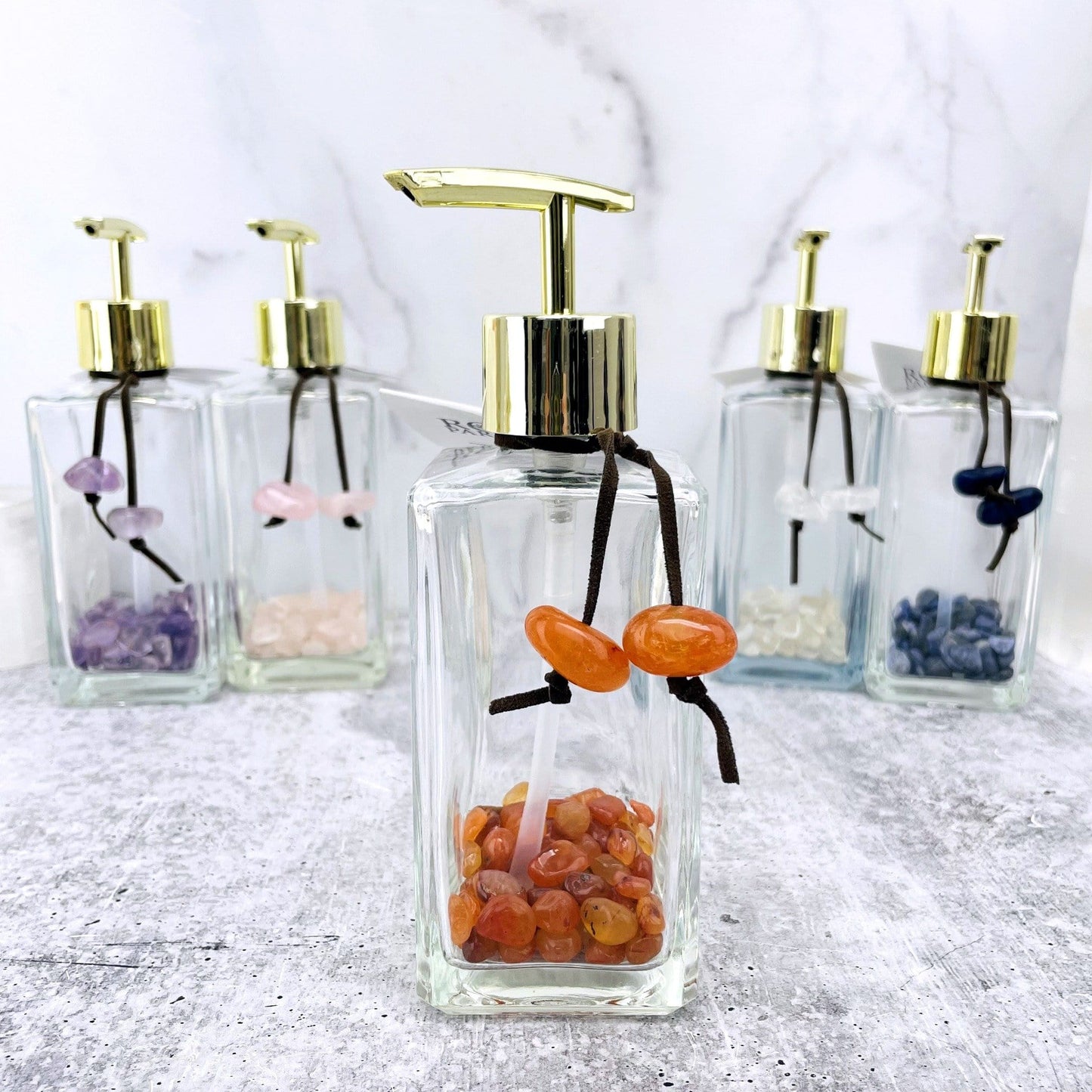 Carnelian tumbled stone soap dispenser up close