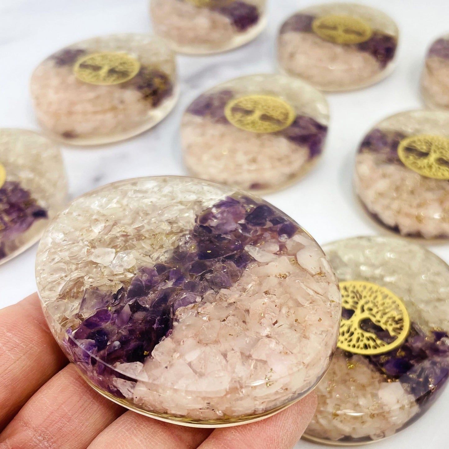 back side of the palm stone with chips of crystal quartz amethyst rose quartz