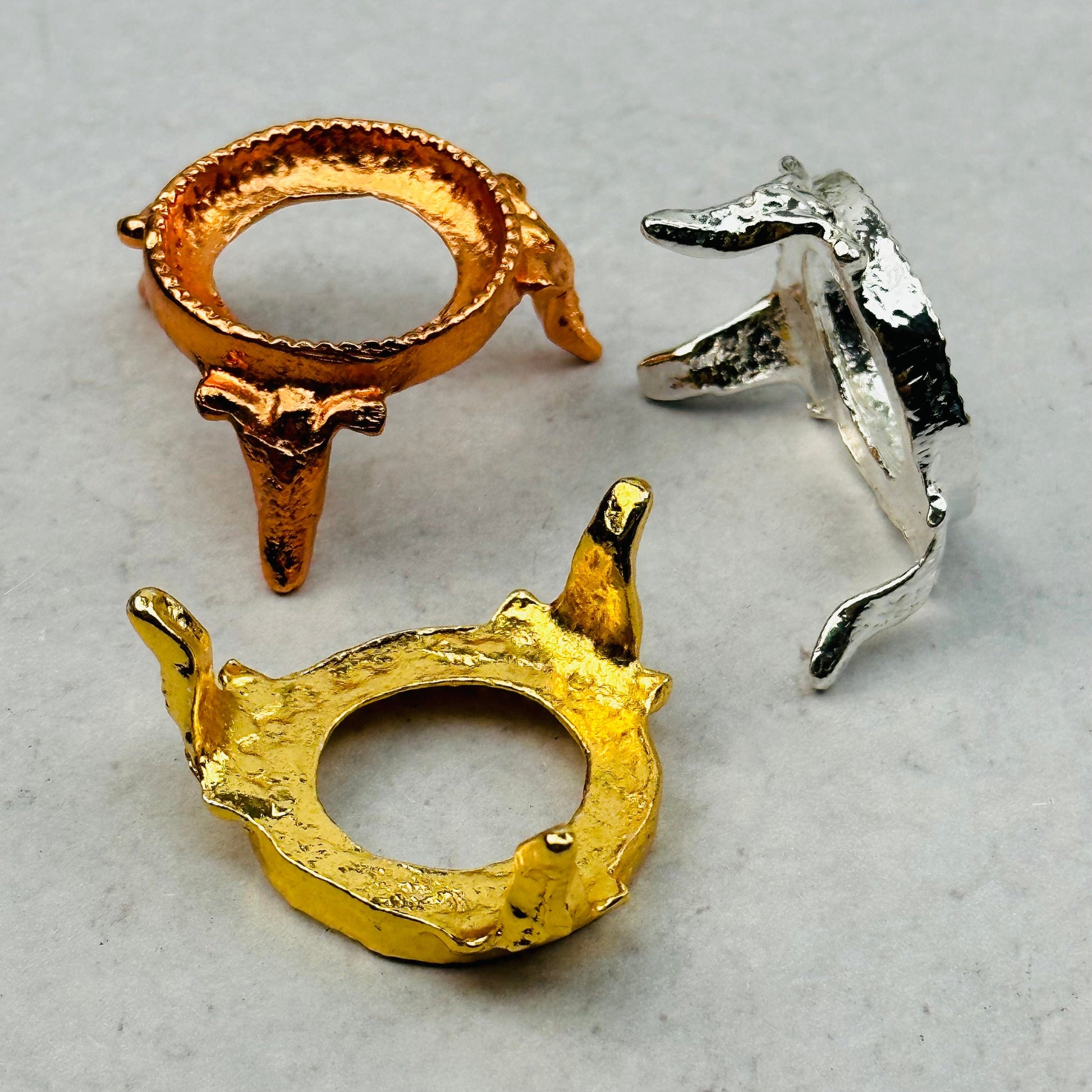 top, side and bottom of the sphere holders 